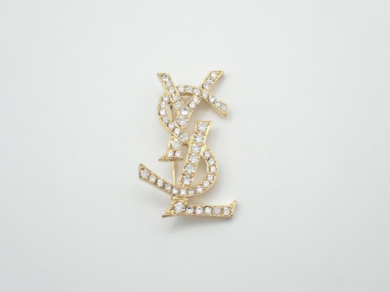 Logo rhinestone brooch, gold
