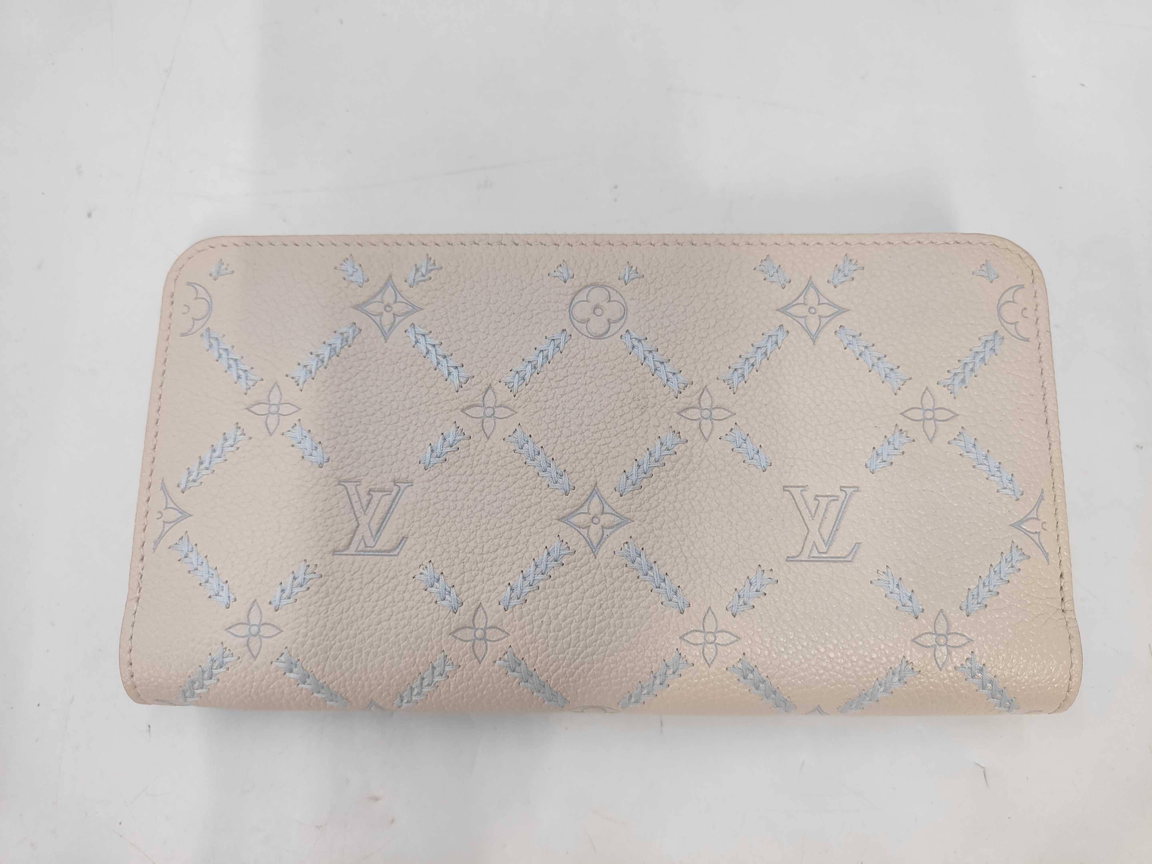 Monogram M28510 Empreinte Quartz Couture Zippy Wallet (Japan Limited Edition)