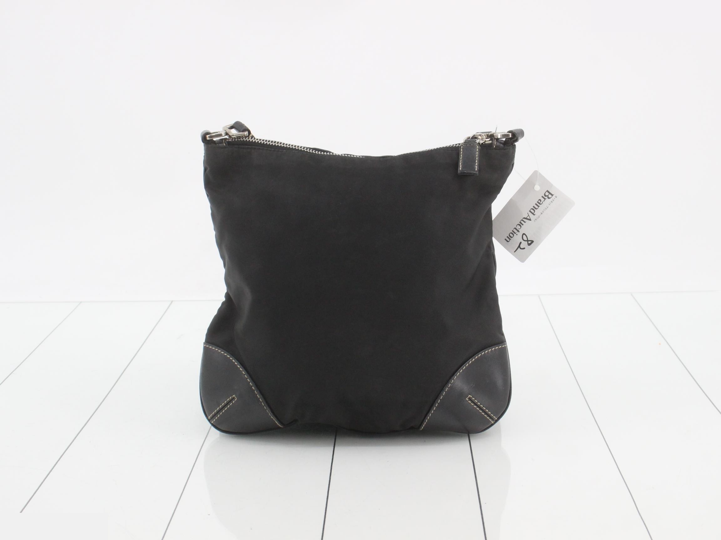 Nylon and leather shoulder bag with triangular plate — view 2