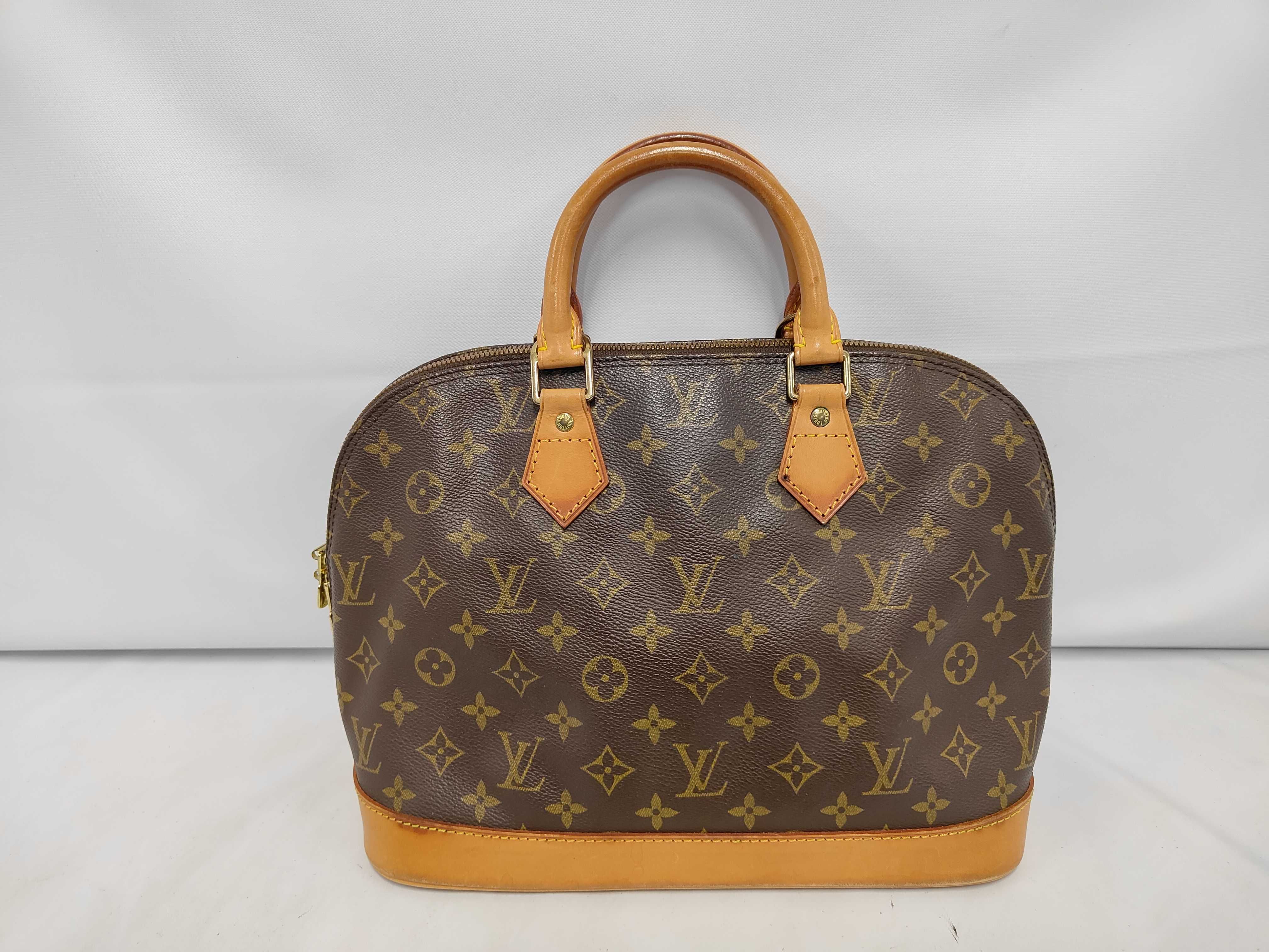 Alma Monogram Handbag VI0974