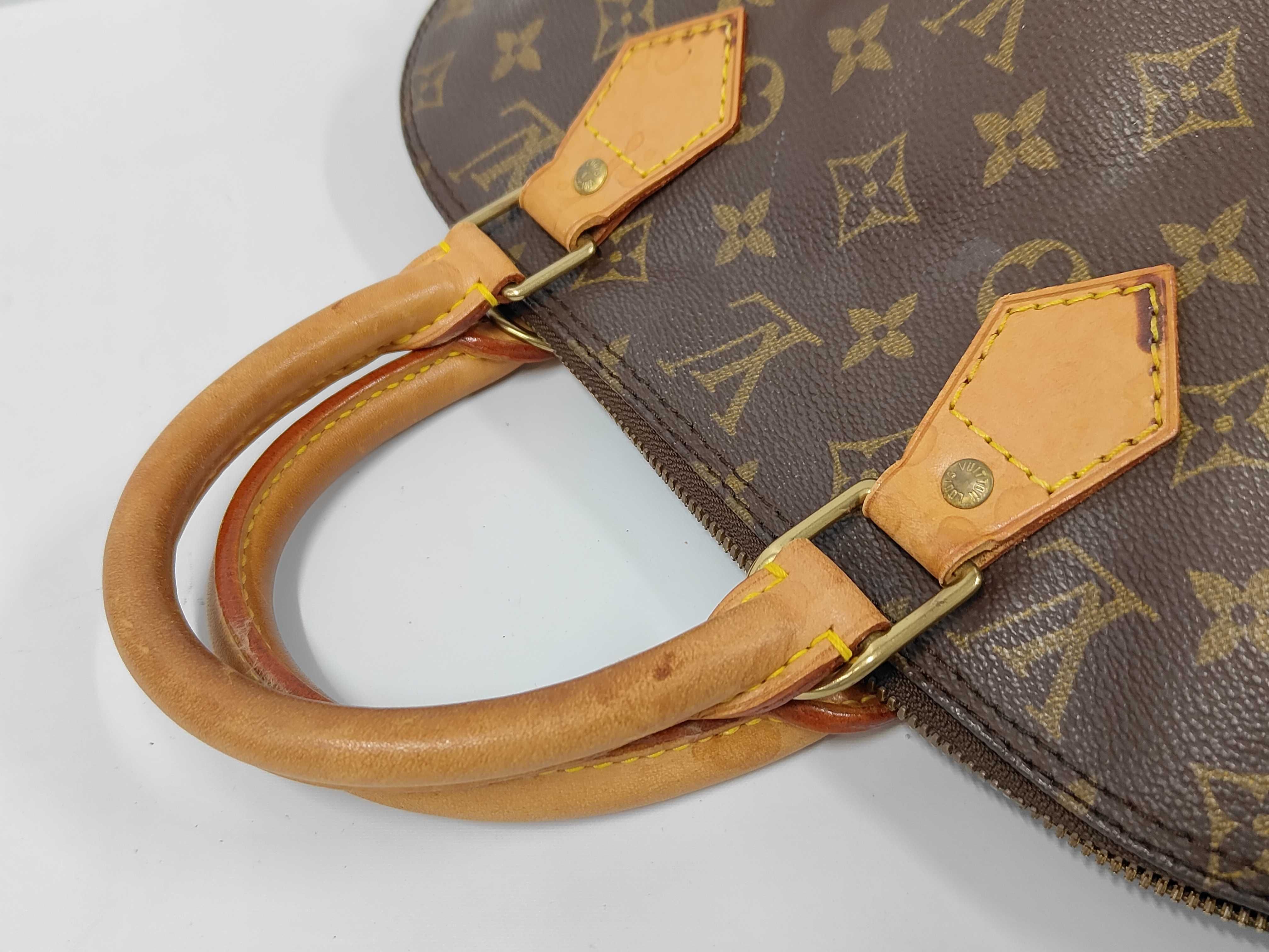 LV Monogram Alma M51130 Handbag — view 5