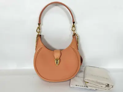 Serpenti 2-way chain shoulder bag with rain cover, strap, and pouch. IC chip compatible.