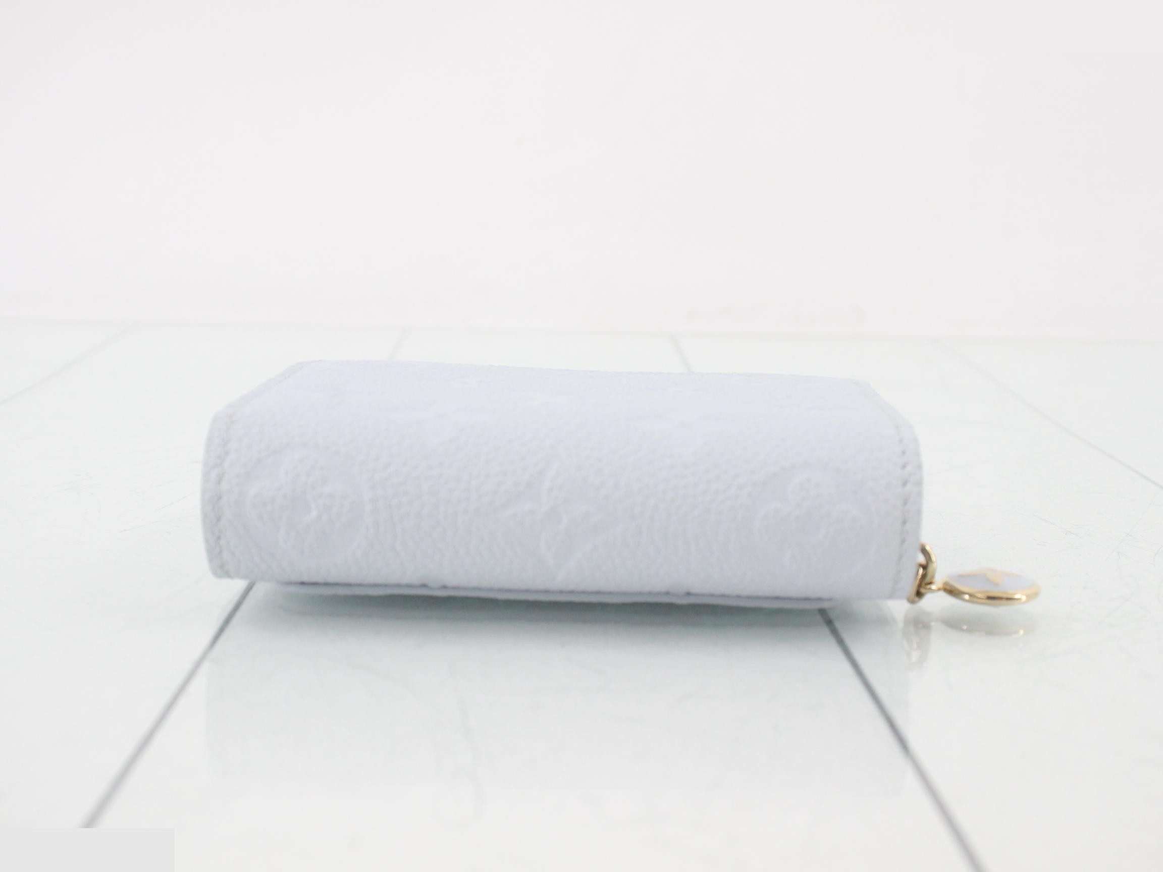 Monogram Empreinte Portefeuille Claire, unused, stored item. — view 3
