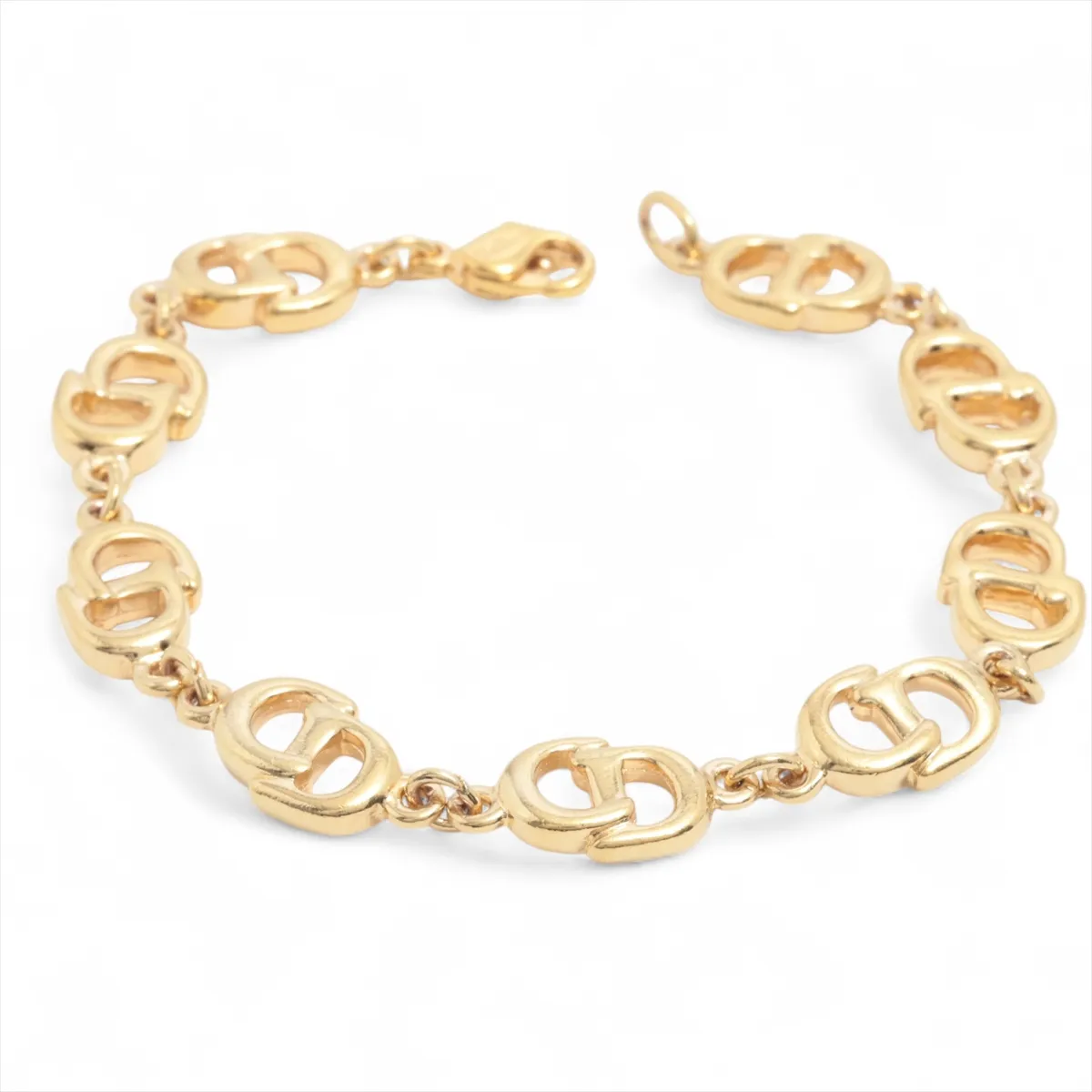 CD logo bracelet, GP gold. Shows signs of wear,
