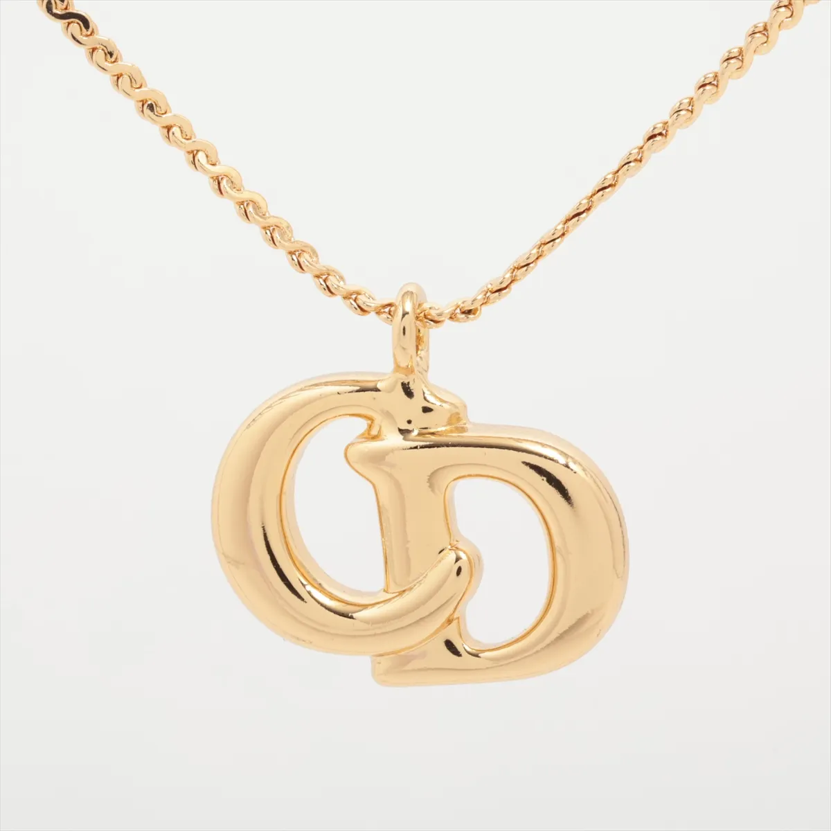 CD logo necklace, GP gold. Shows signs of wear including — view 2