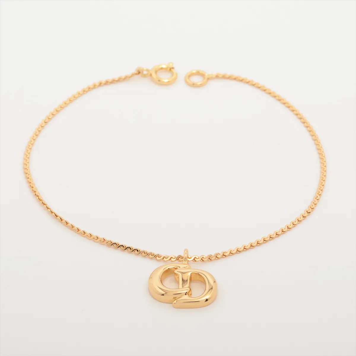 CD logo necklace, GP gold. Shows signs of wear including — view 7