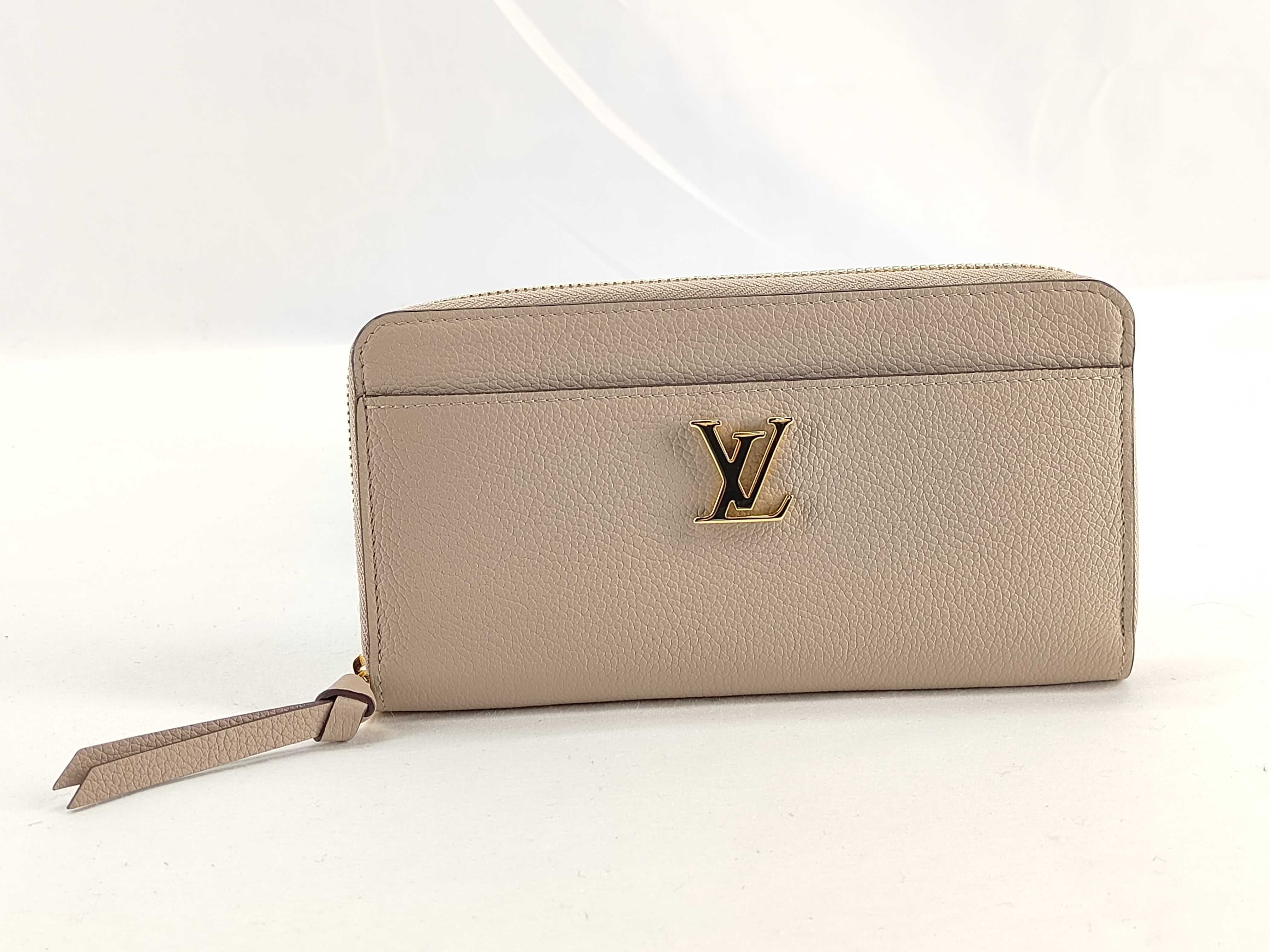 LV logo Zippy Lockme M80674 wallet