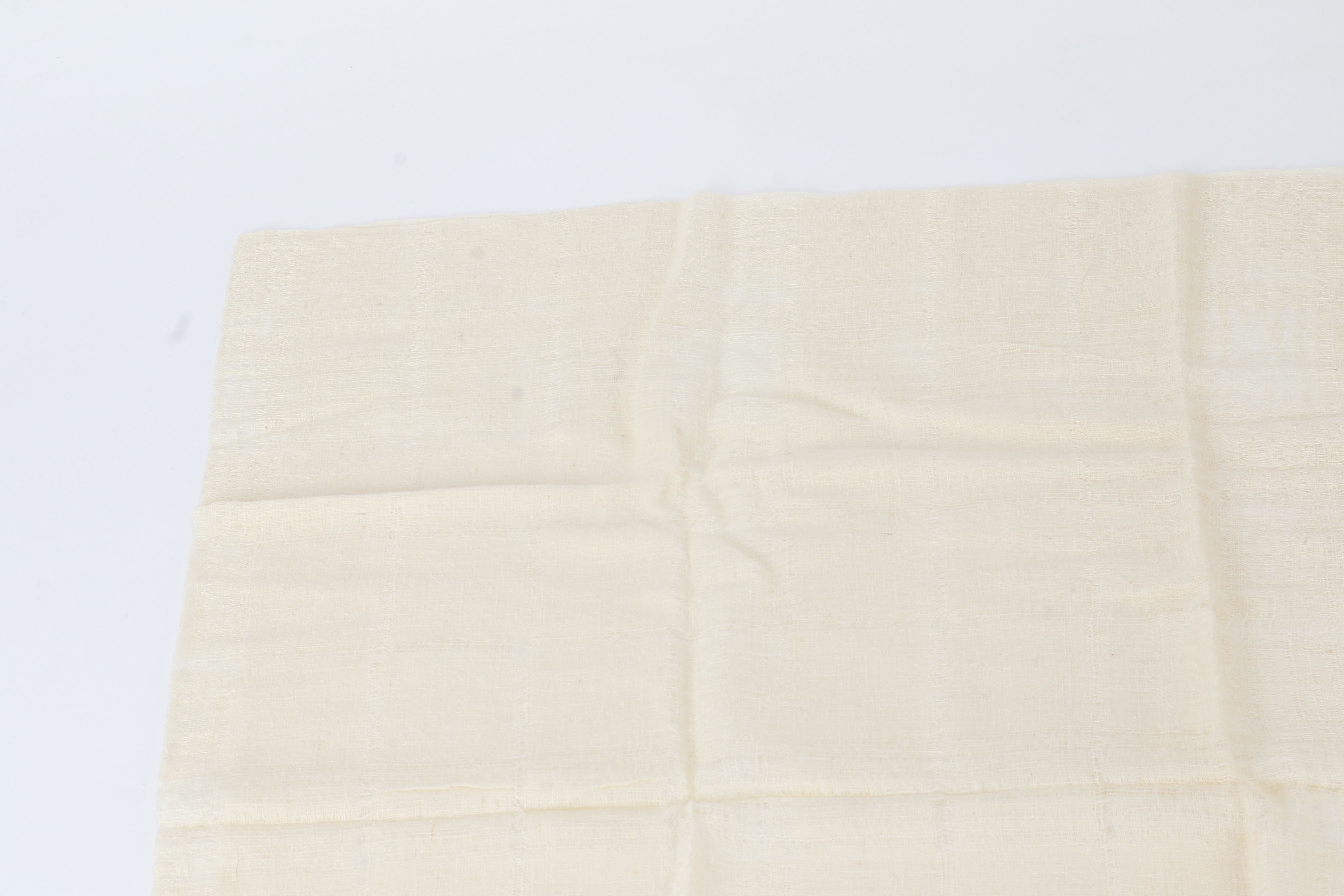 scarf/stole with tag, beige, fringe, and other accessories. — view 3