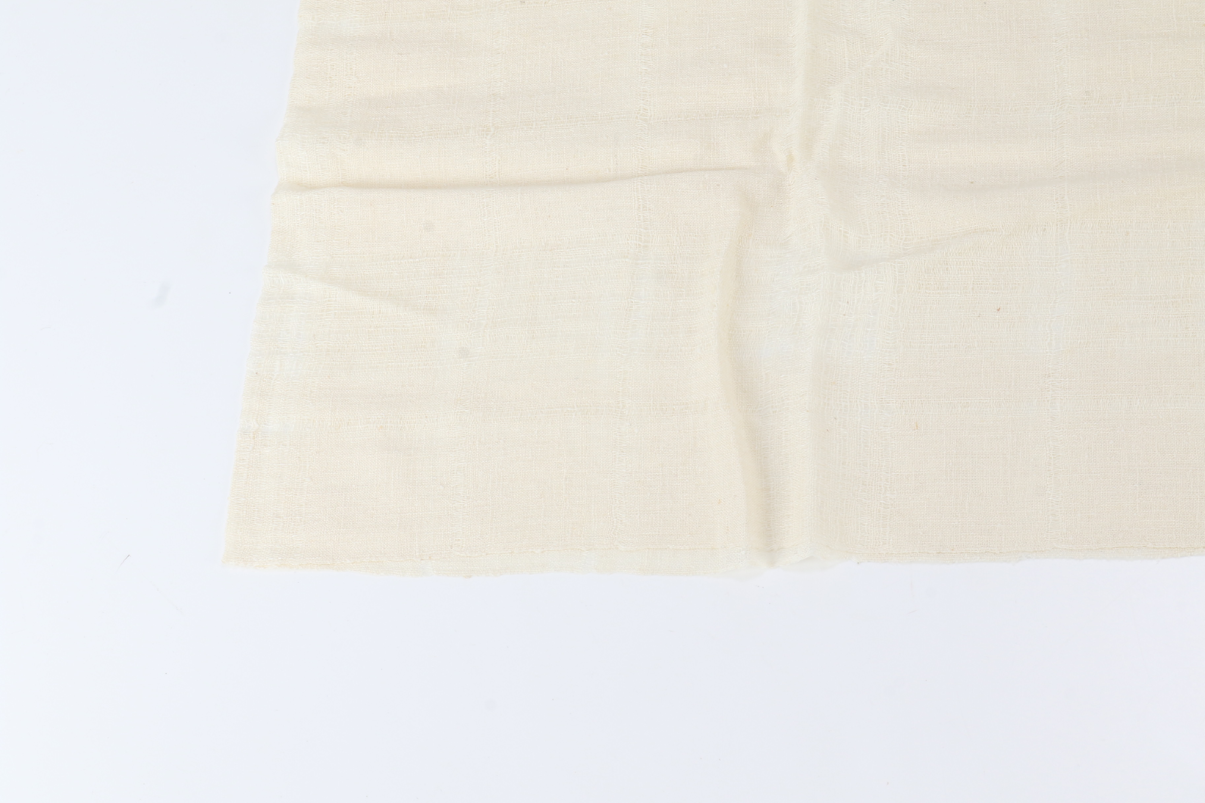 scarf/stole with tag, beige, fringe, and other accessories. — view 4