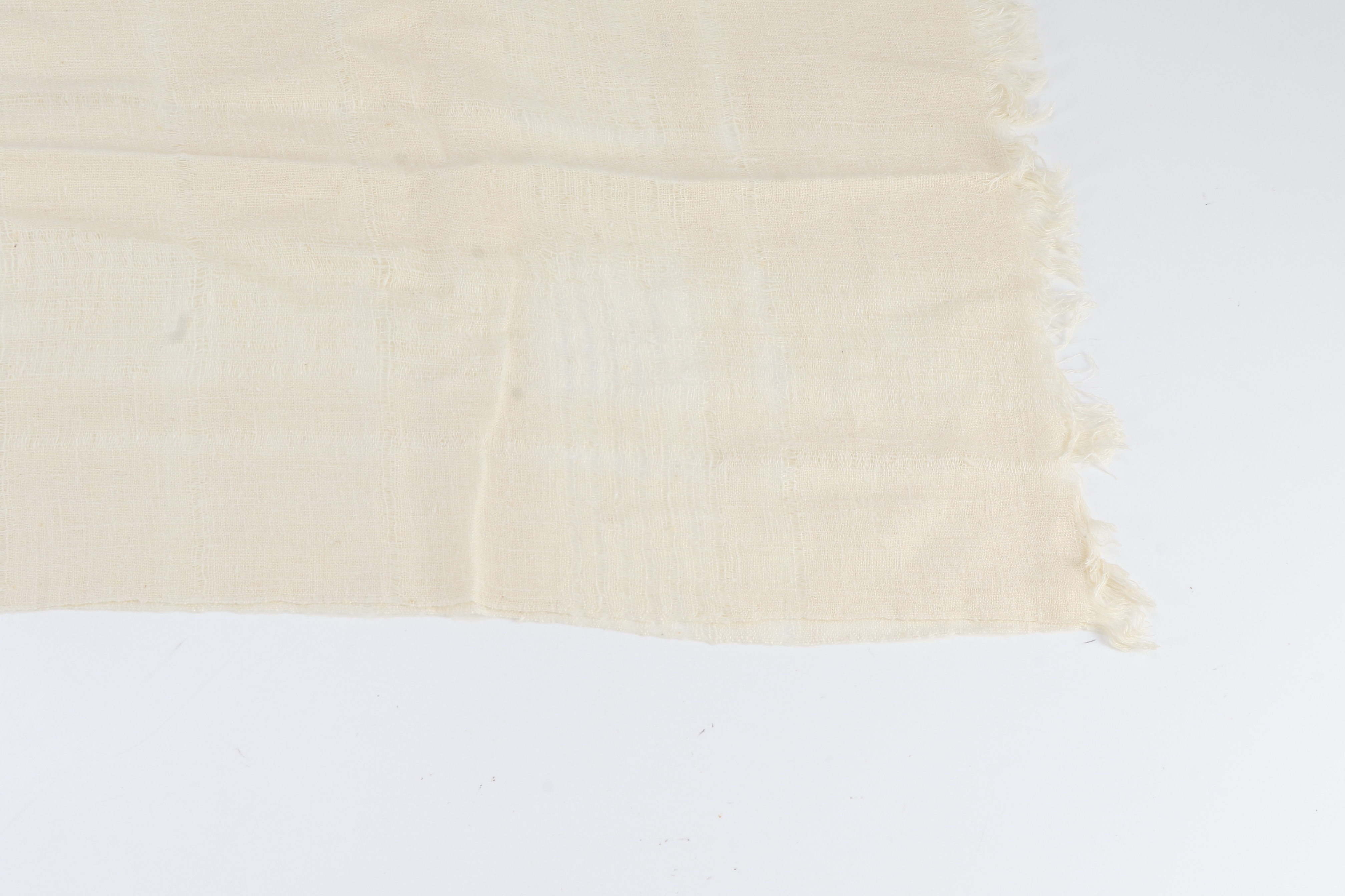 scarf/stole with tag, beige, fringe, and other accessories. — view 5