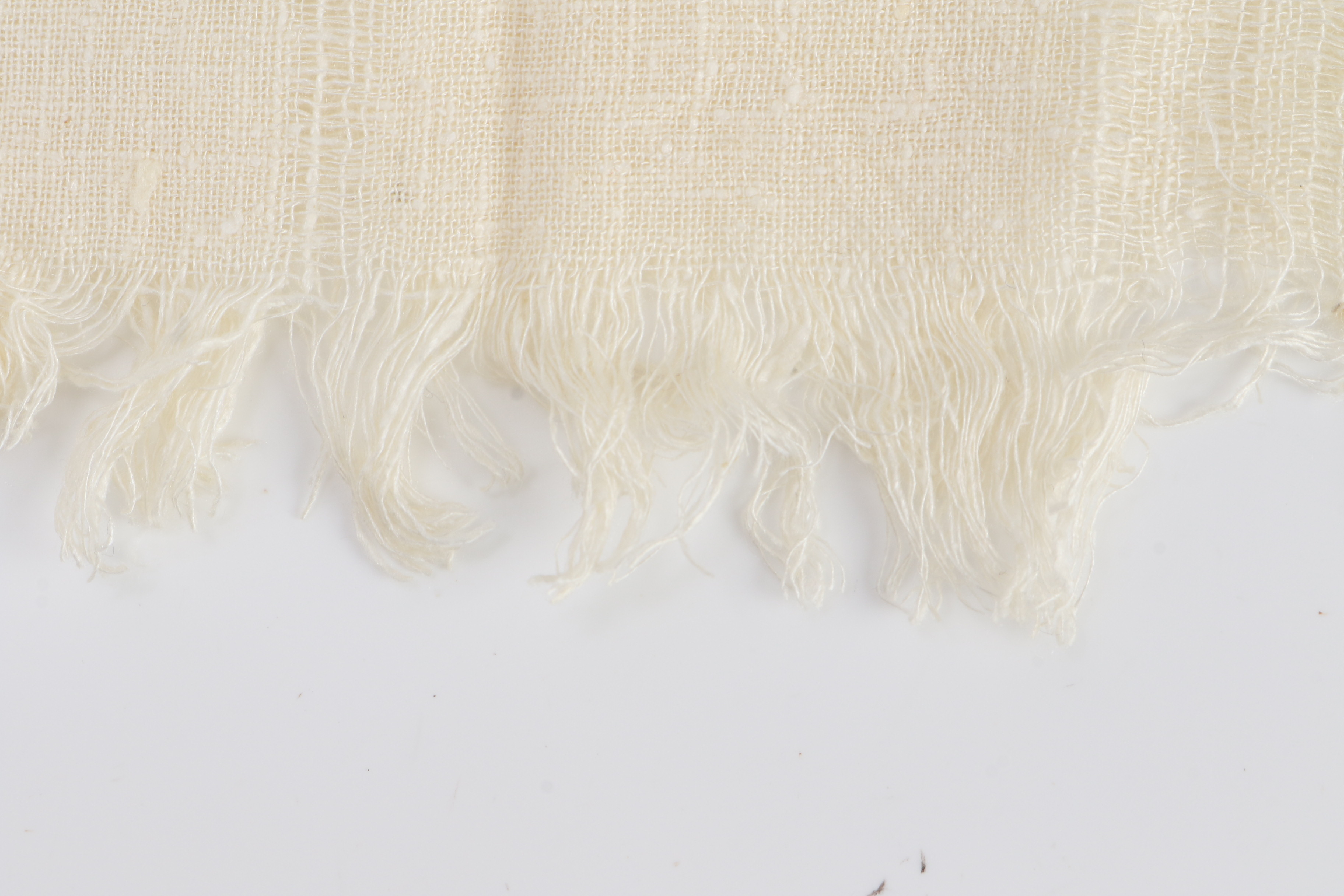 scarf/stole with tag, beige, fringe, and other accessories. — view 7