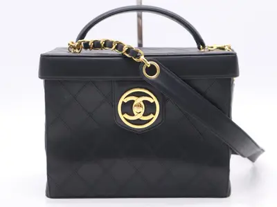 Leather 2-way vanity case, black, gold hardware, shoulder strap and seal included.