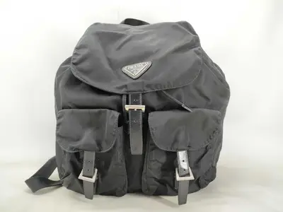 nylon backpack with triangular logo, 2 pockets, black.