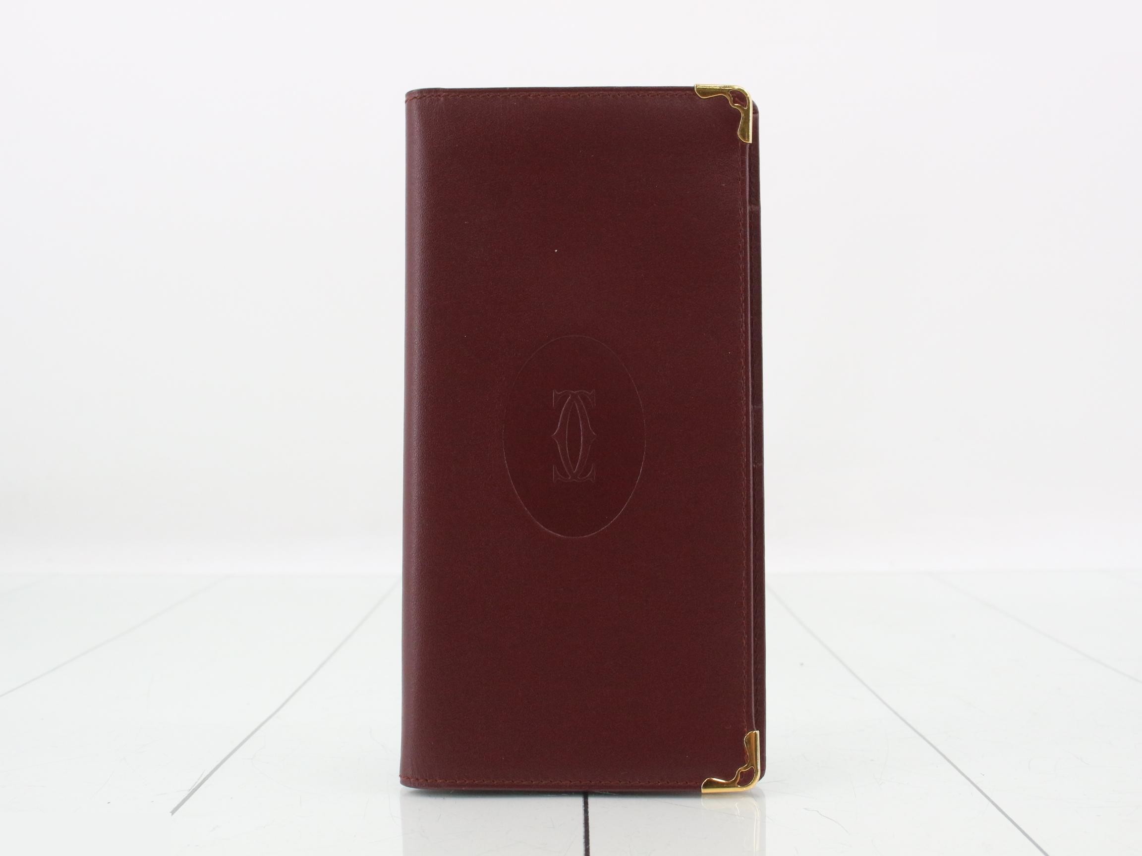 Unused Must Line bi-fold long wallet, burgundy.