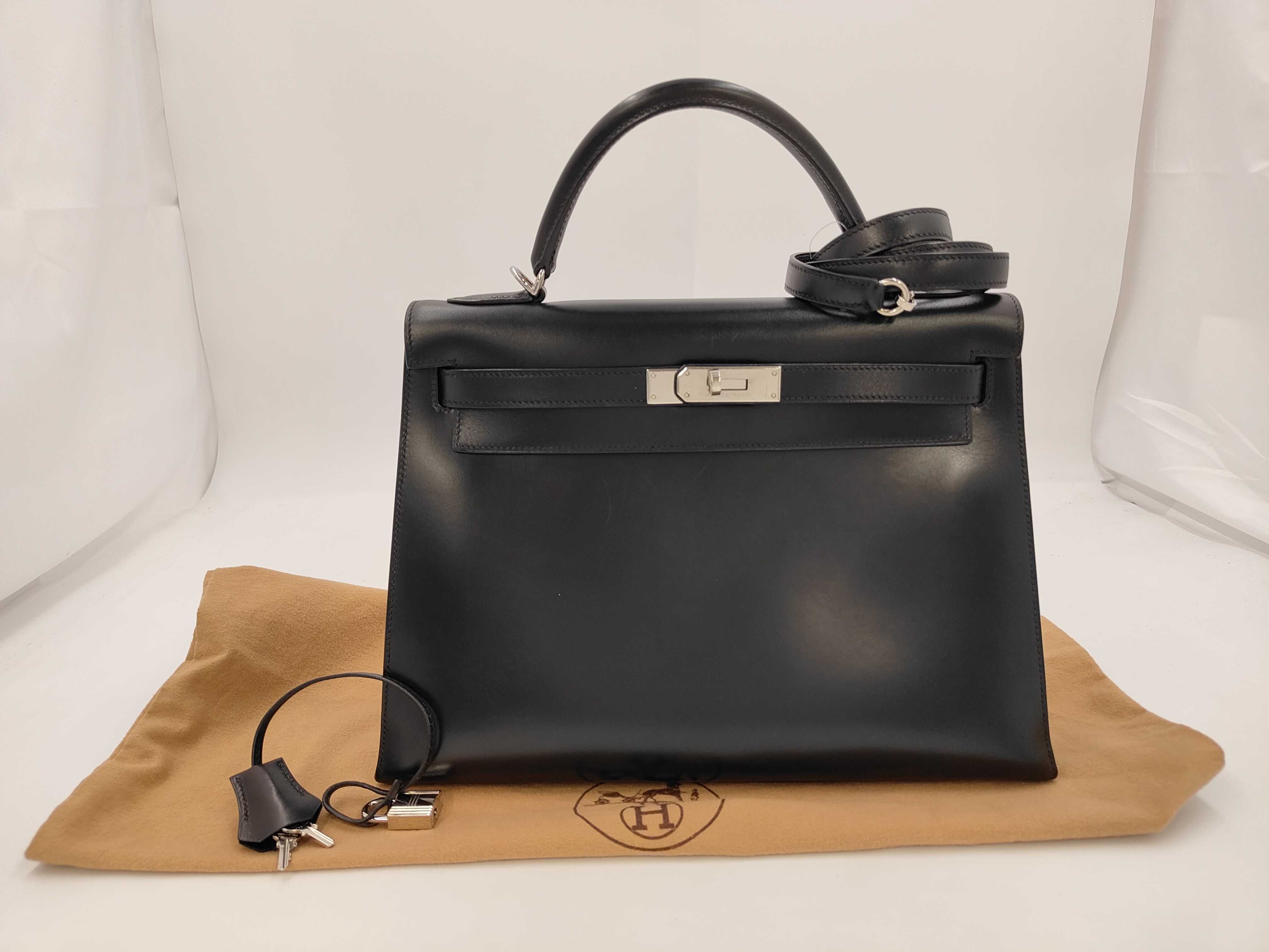 Kelly 32, external stitching, box calf leather, black, silver hardware, D stamp, handbag