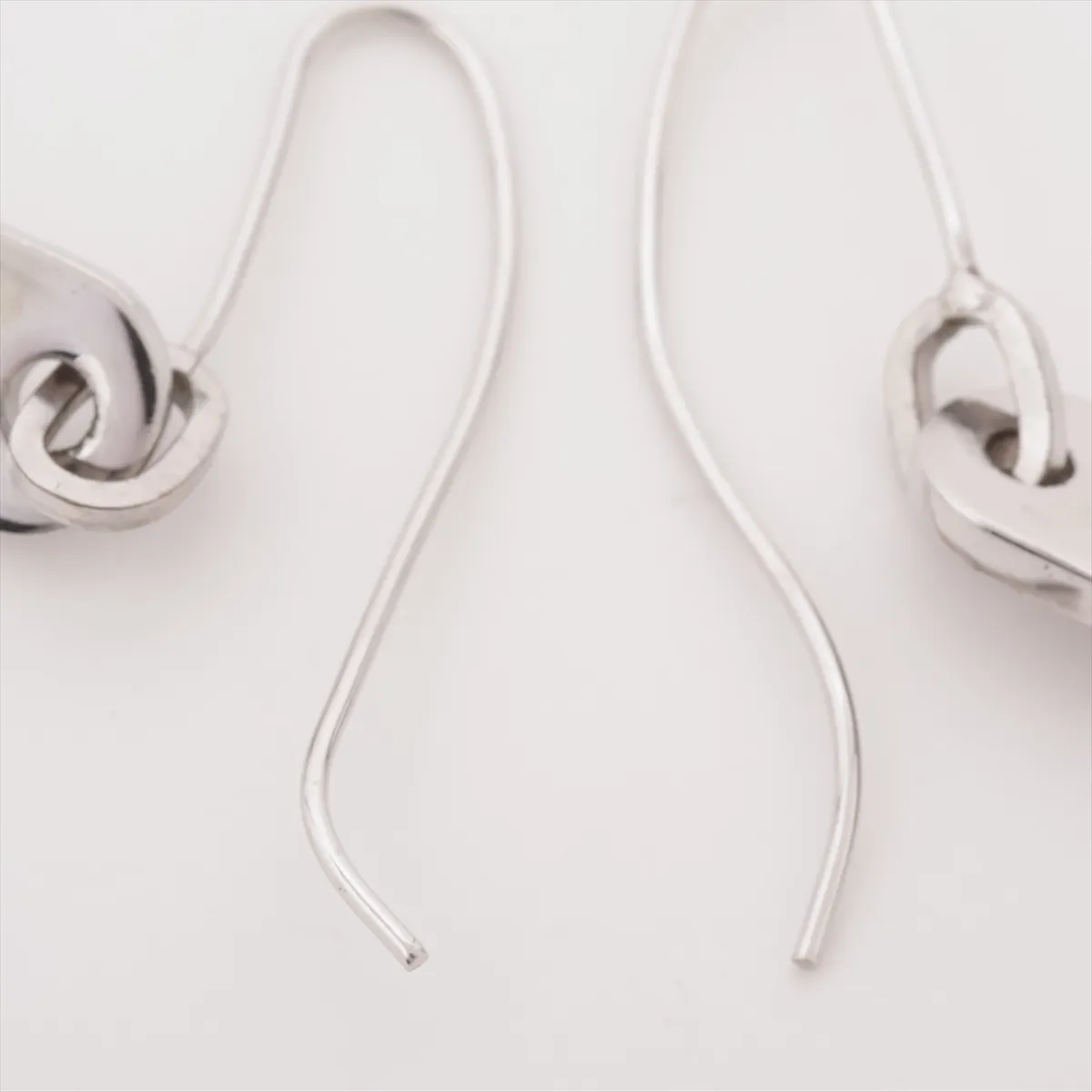 logo earrings (for both ears), metal, silver. Shows signs of wear, — view 4