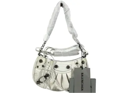Unused, with tags attached. Balenciaga Le Cagoll XS 2-way bag.