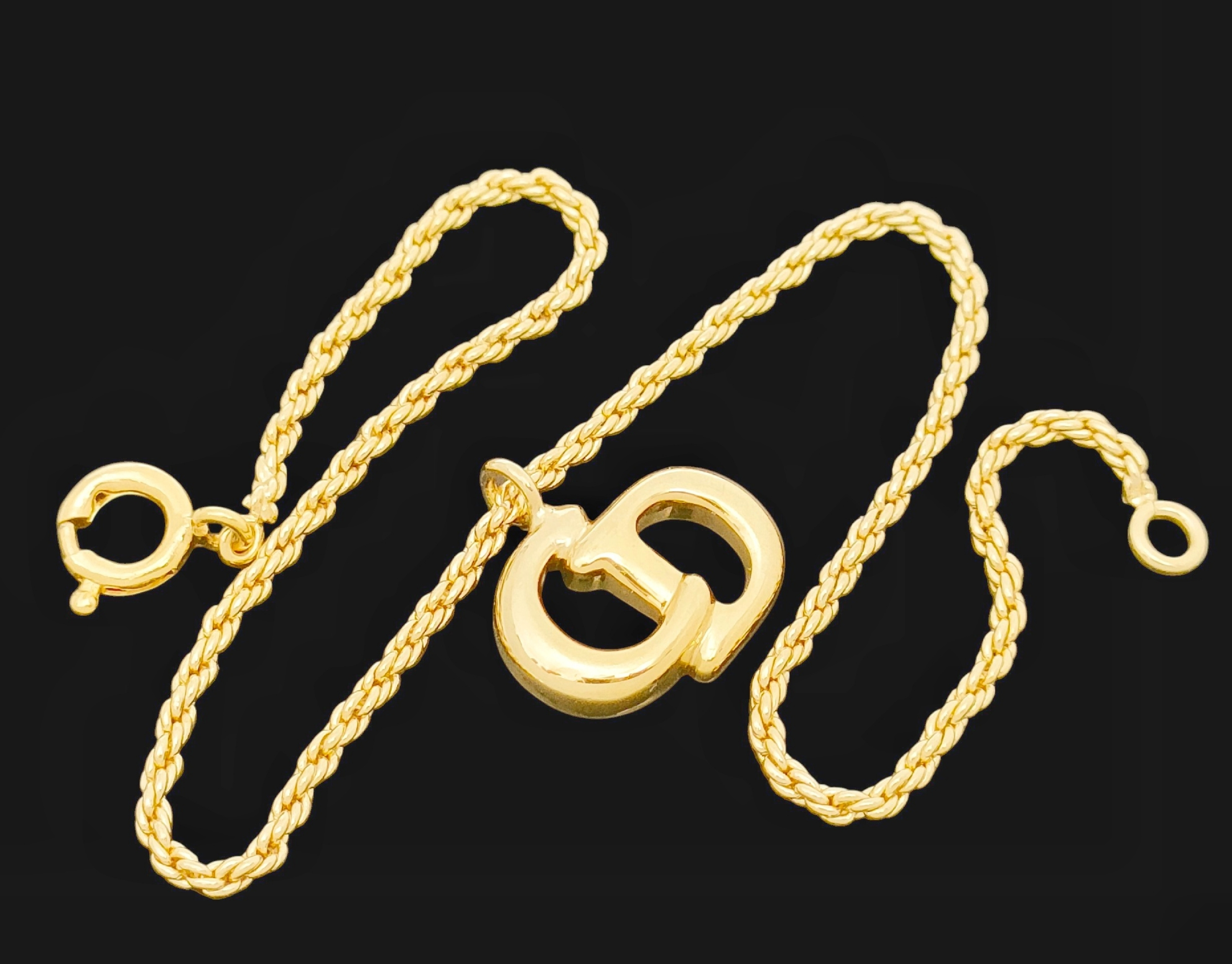 Christian Gold-colored logo design bracelet, 2.88g. Bracelet/Bangle. — view 3