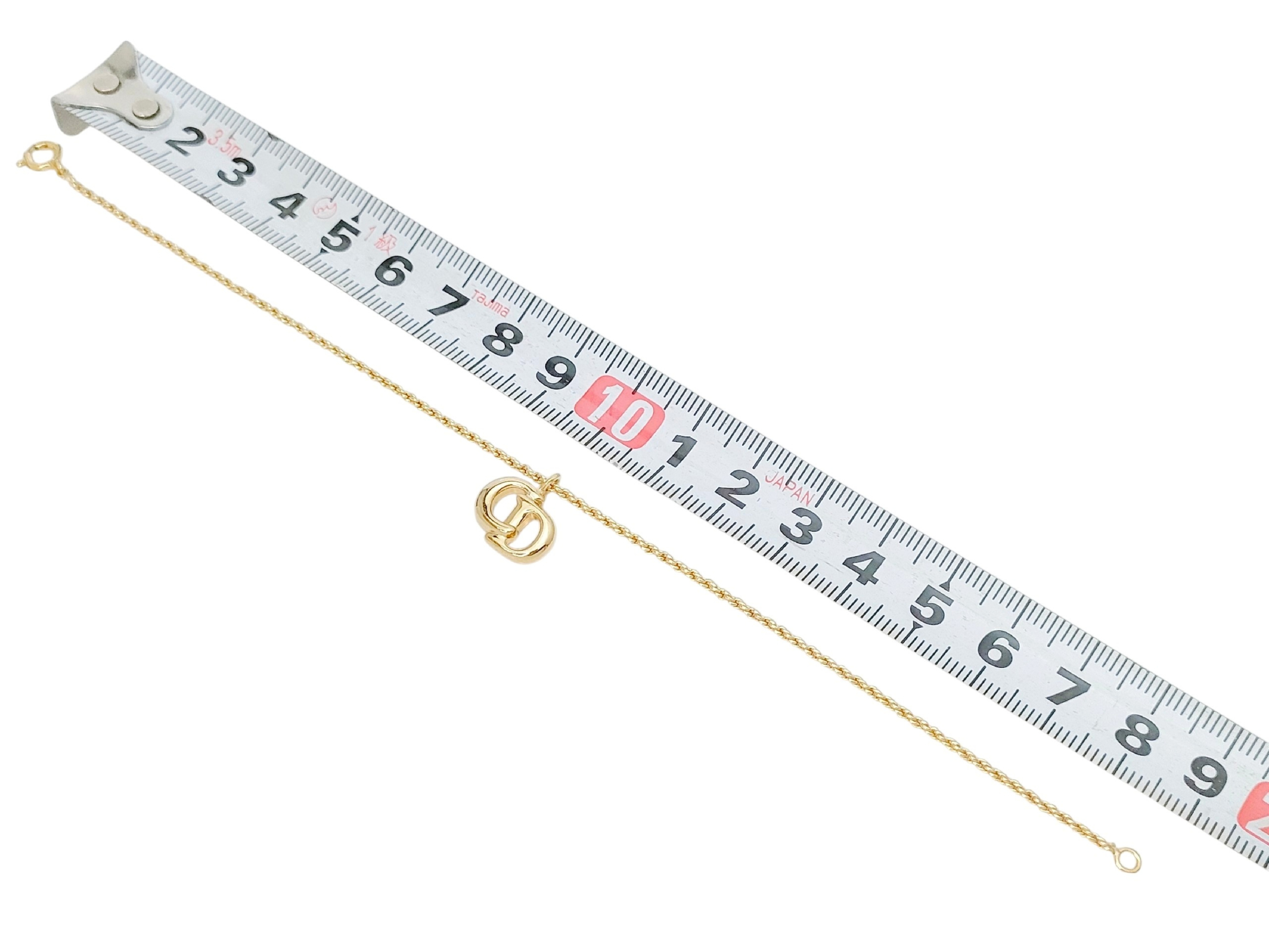 Christian Gold-colored logo design bracelet, 2.88g. Bracelet/Bangle. — view 7
