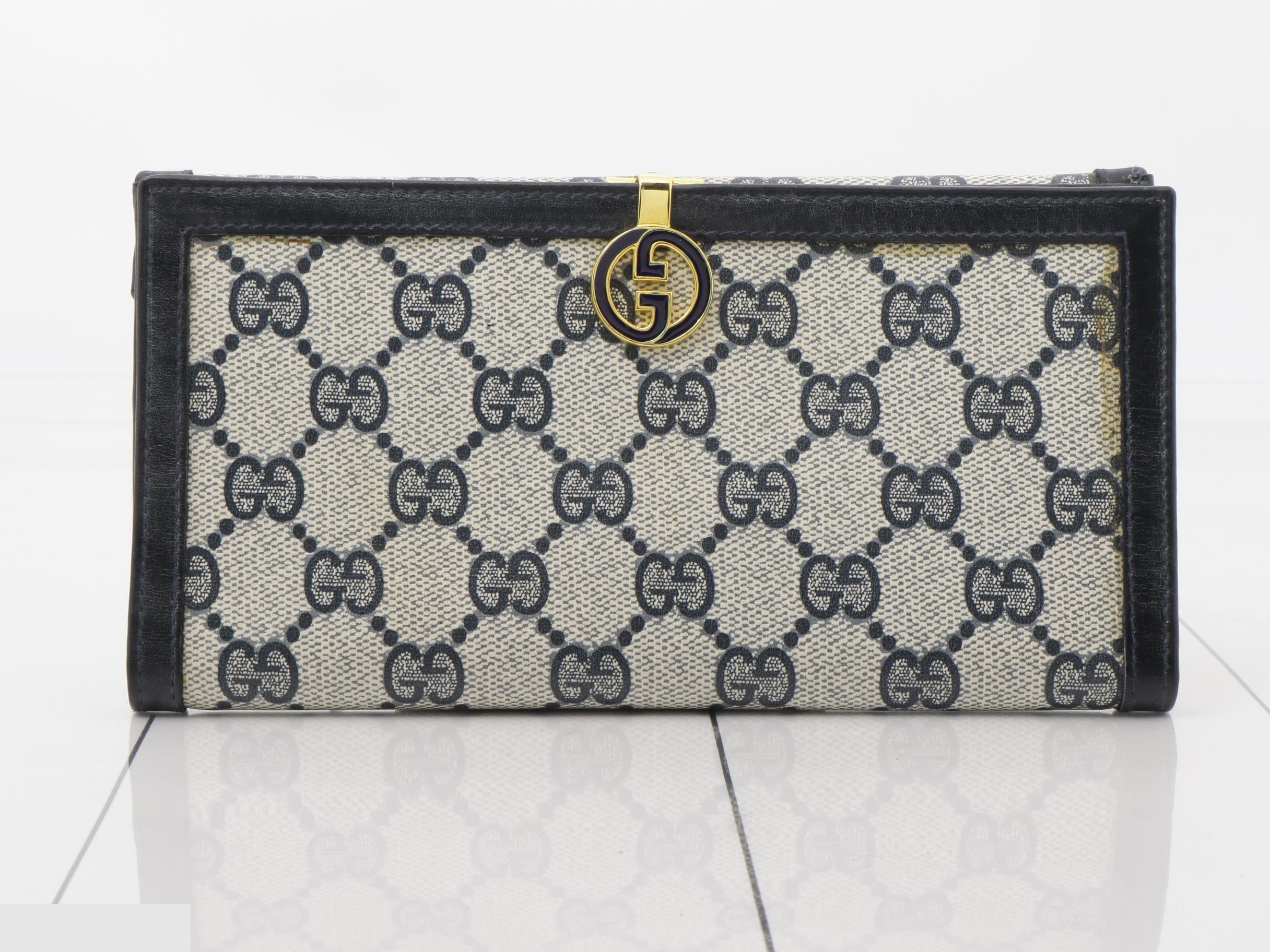 Vintage Gucci bi-fold wallet, navy, gold hardware