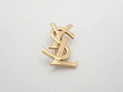 logo brooch
