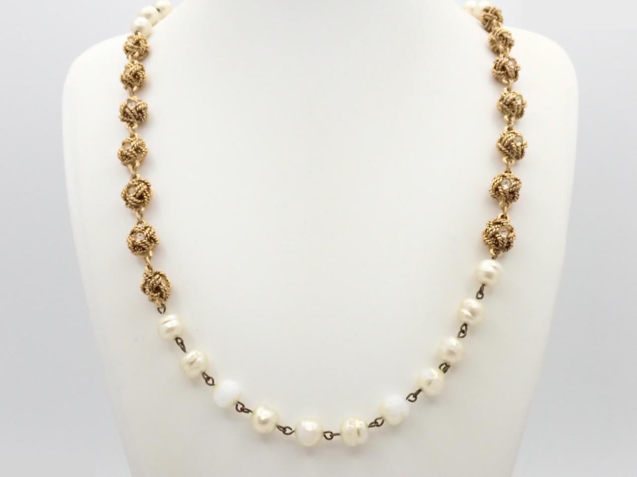 Pearl necklace with Coco Chanel logo, gold finish, approximately 90cm in length.