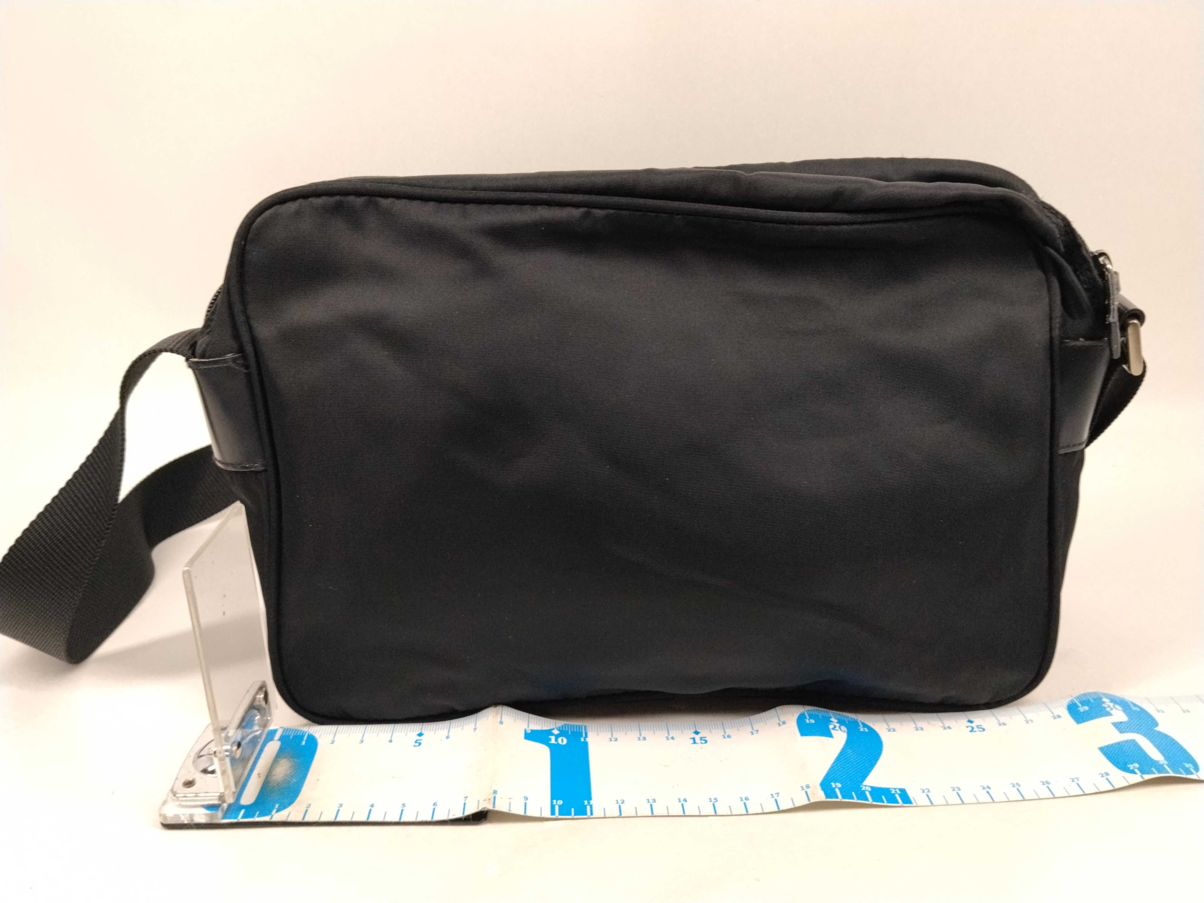 Nylon Shoulder Bag / Shoulder bag with some loose threads on the outside. — view 2