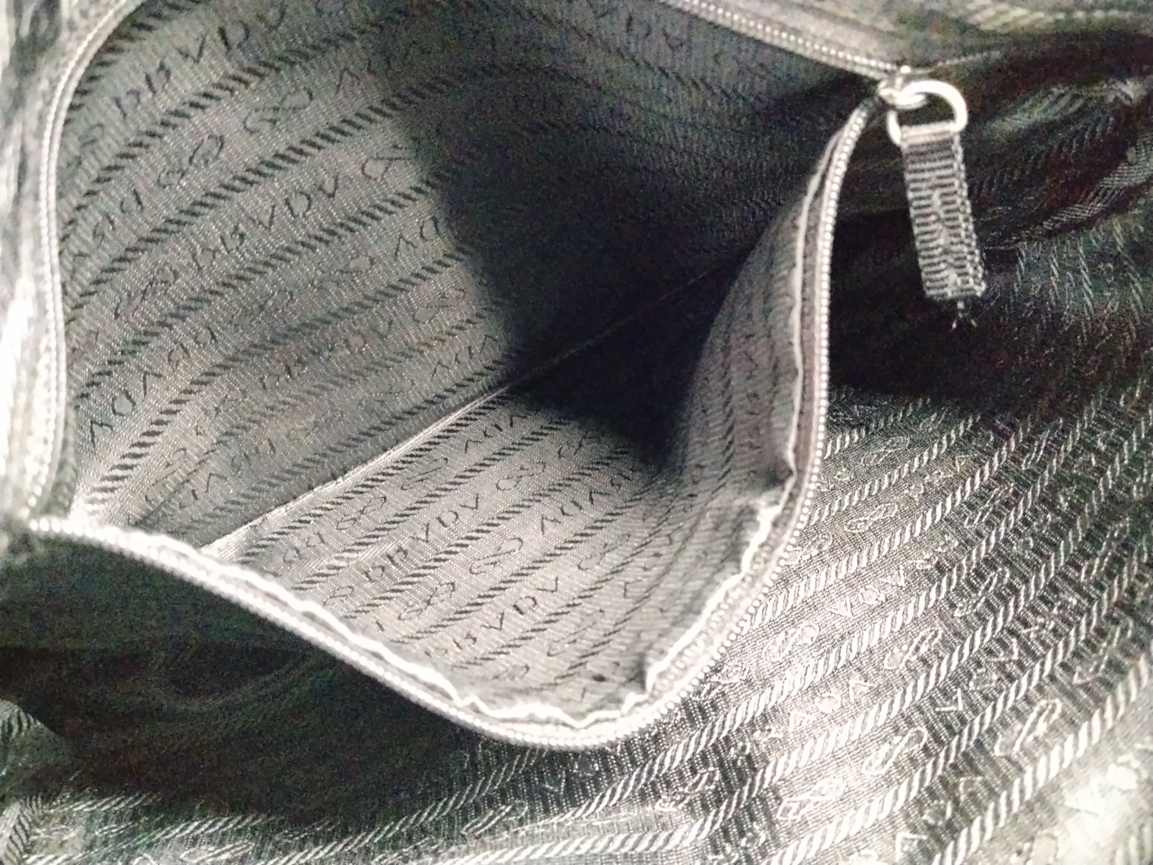 Nylon Shoulder Bag / Shoulder bag with some loose threads on the outside. — view 11