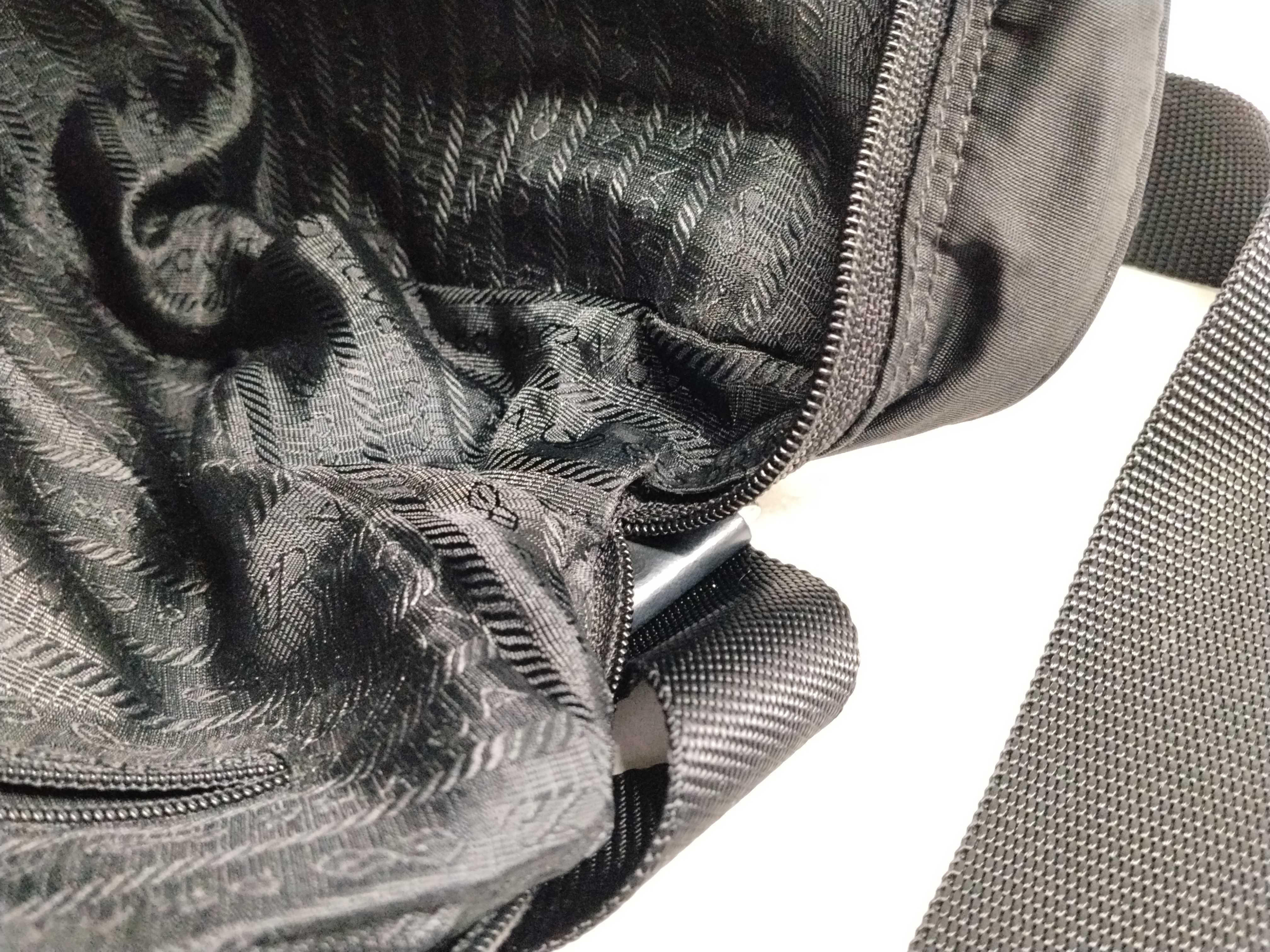 Nylon Shoulder Bag / Shoulder bag with some loose threads on the outside. — view 12