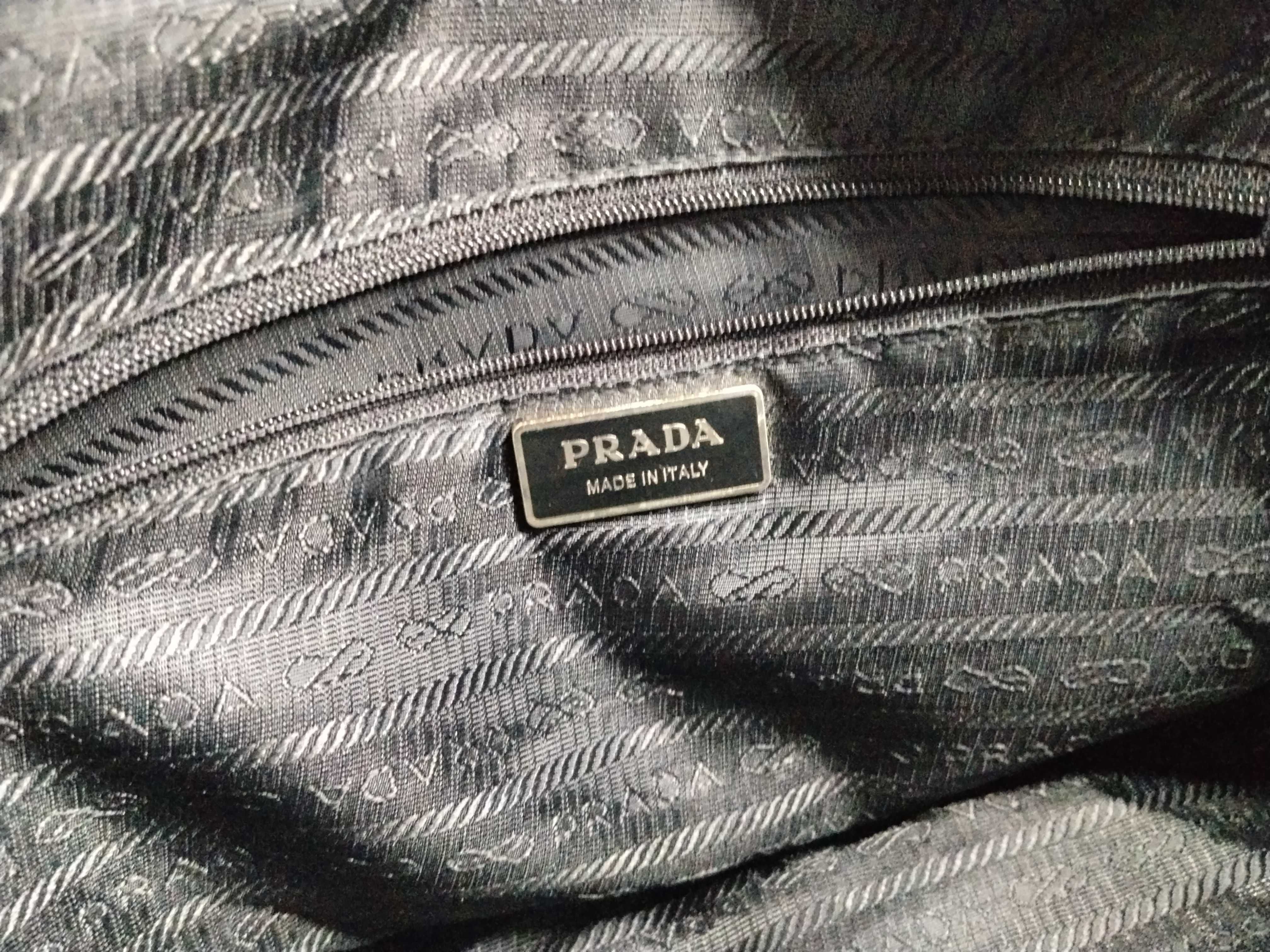 Nylon Shoulder Bag / Shoulder bag with some loose threads on the outside. — view 13
