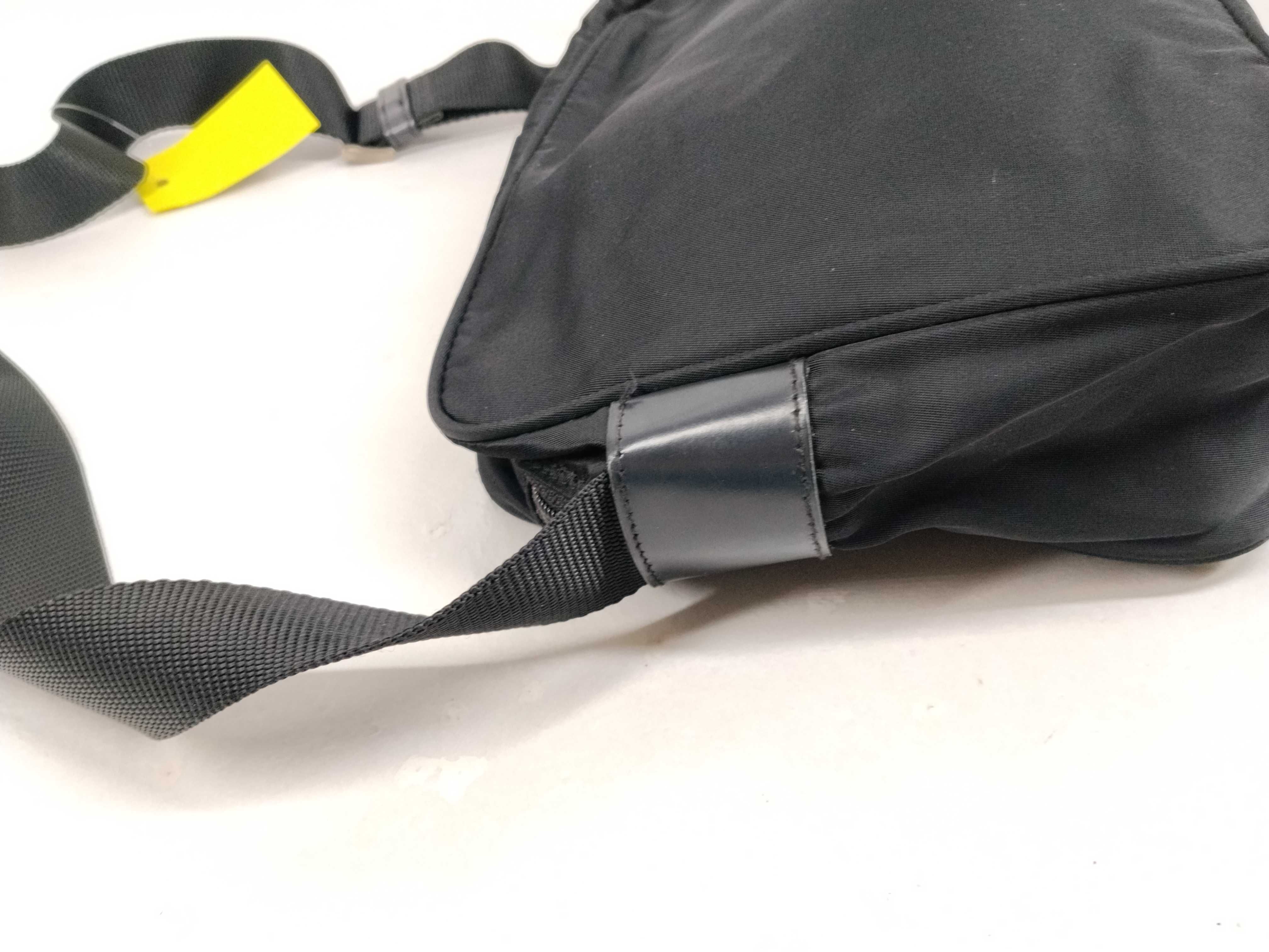Nylon Shoulder Bag / Shoulder bag with some loose threads on the outside. — view 5