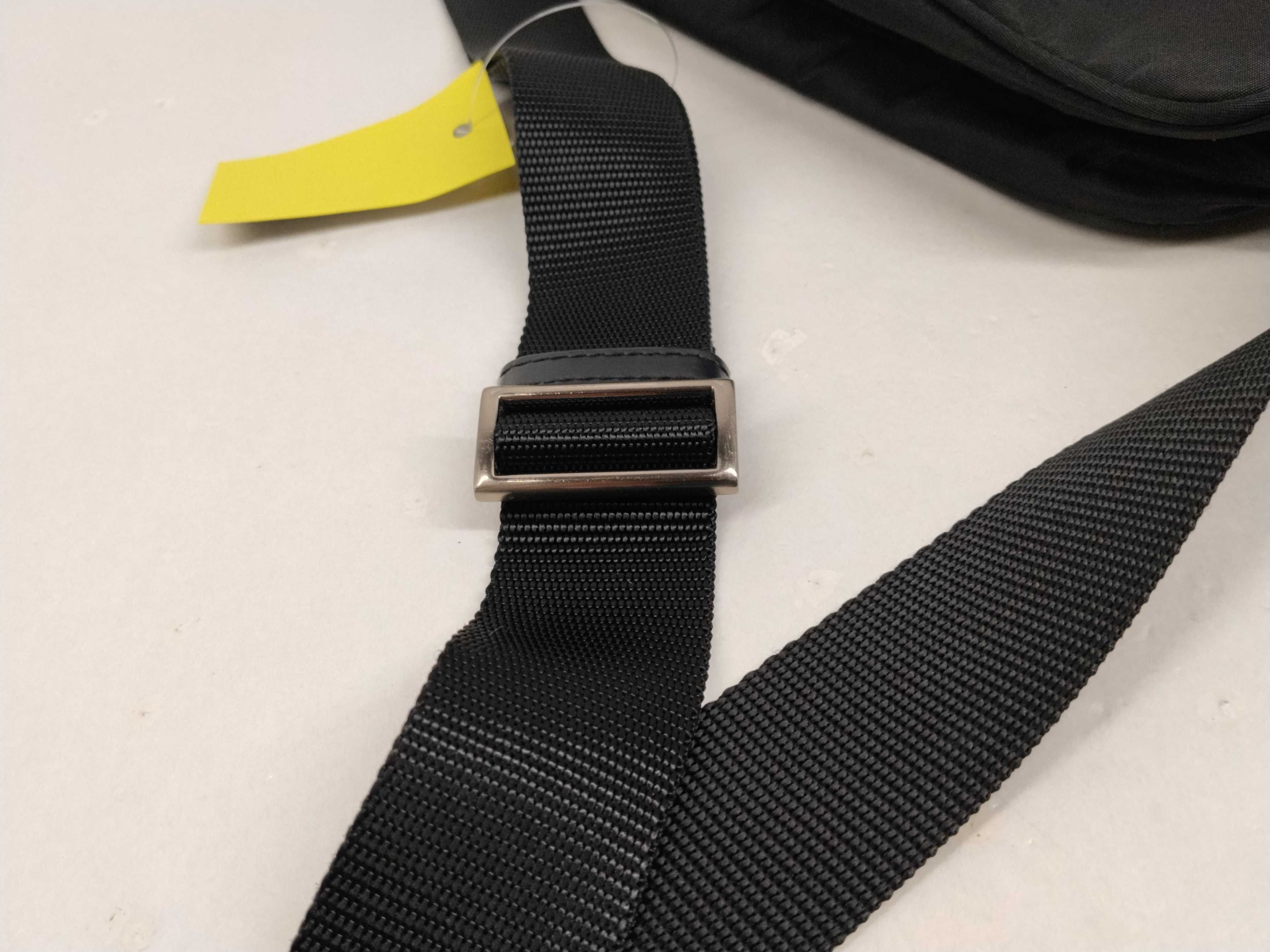 Nylon Shoulder Bag / Shoulder bag with some loose threads on the outside. — view 7