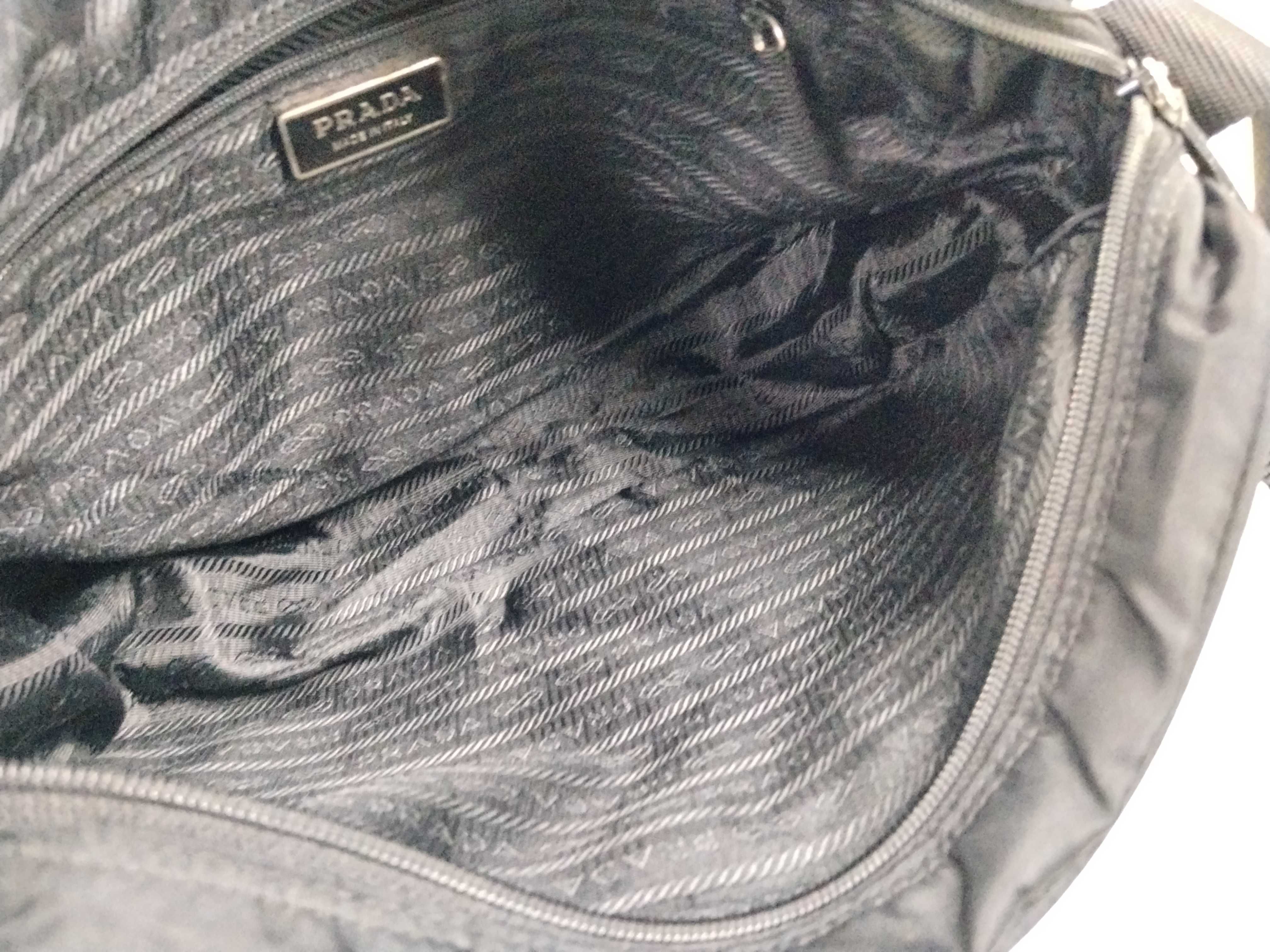 Nylon Shoulder Bag / Shoulder bag with some loose threads on the outside. — view 10