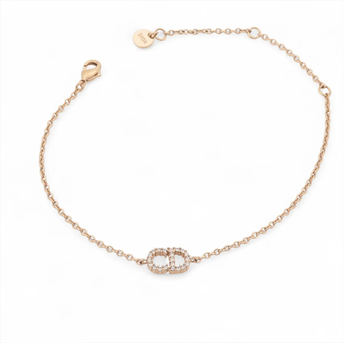 Clair D Lune bracelet, gold-plated with rhinestones. Shows signs of wear,