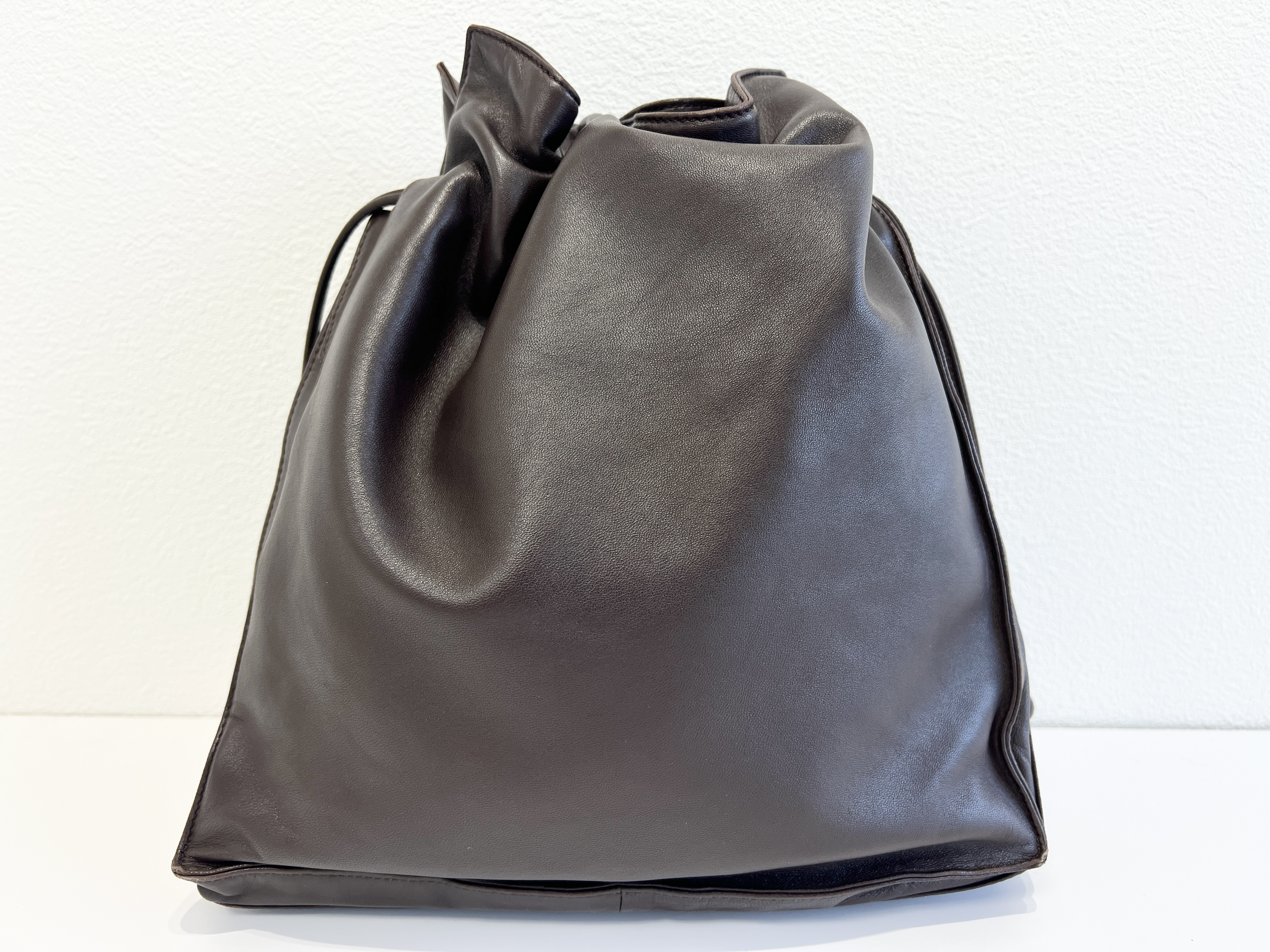 Anagram Flamenco Logo Nappa Leather Drawstring Bucket Handbag — view 2
