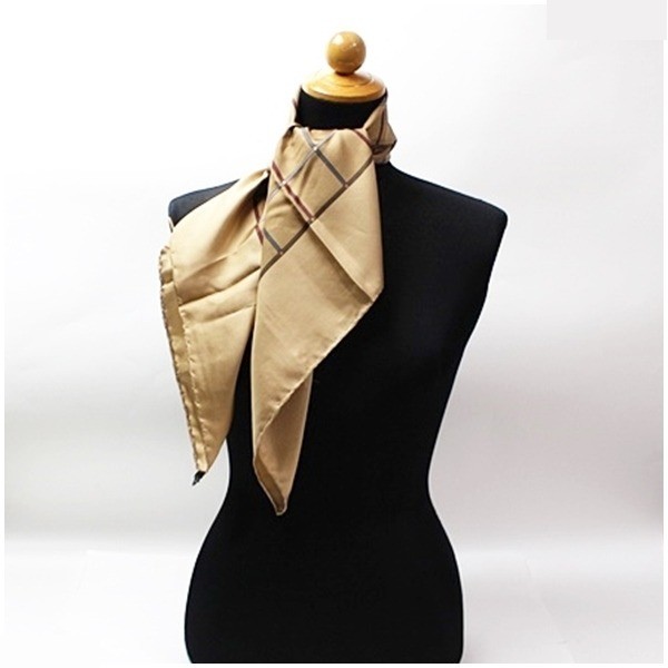 silk scarf, brown, checkered pattern, with rug. — view 3