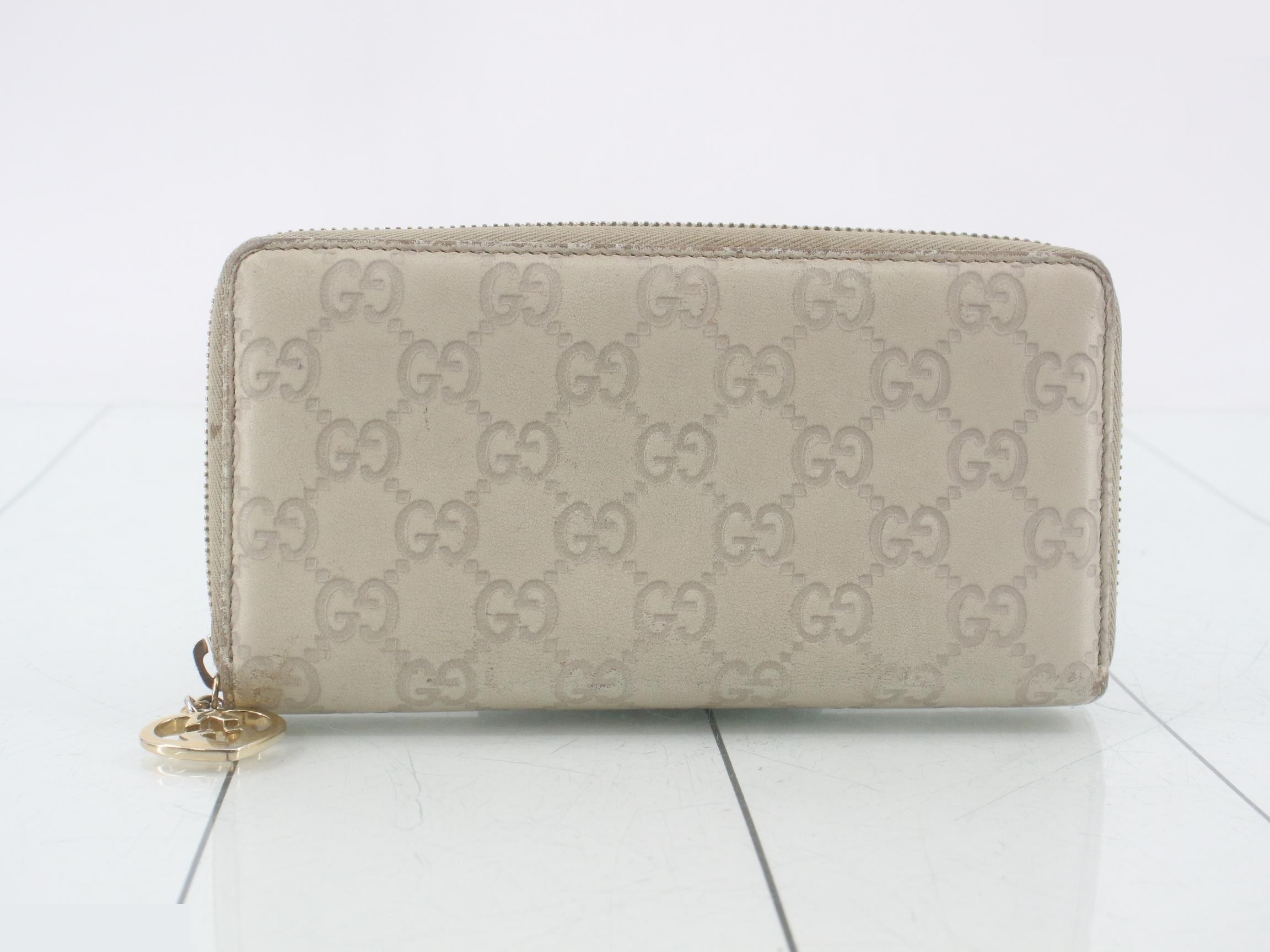 Guccissima (bag) and wallet, round, LOVELY