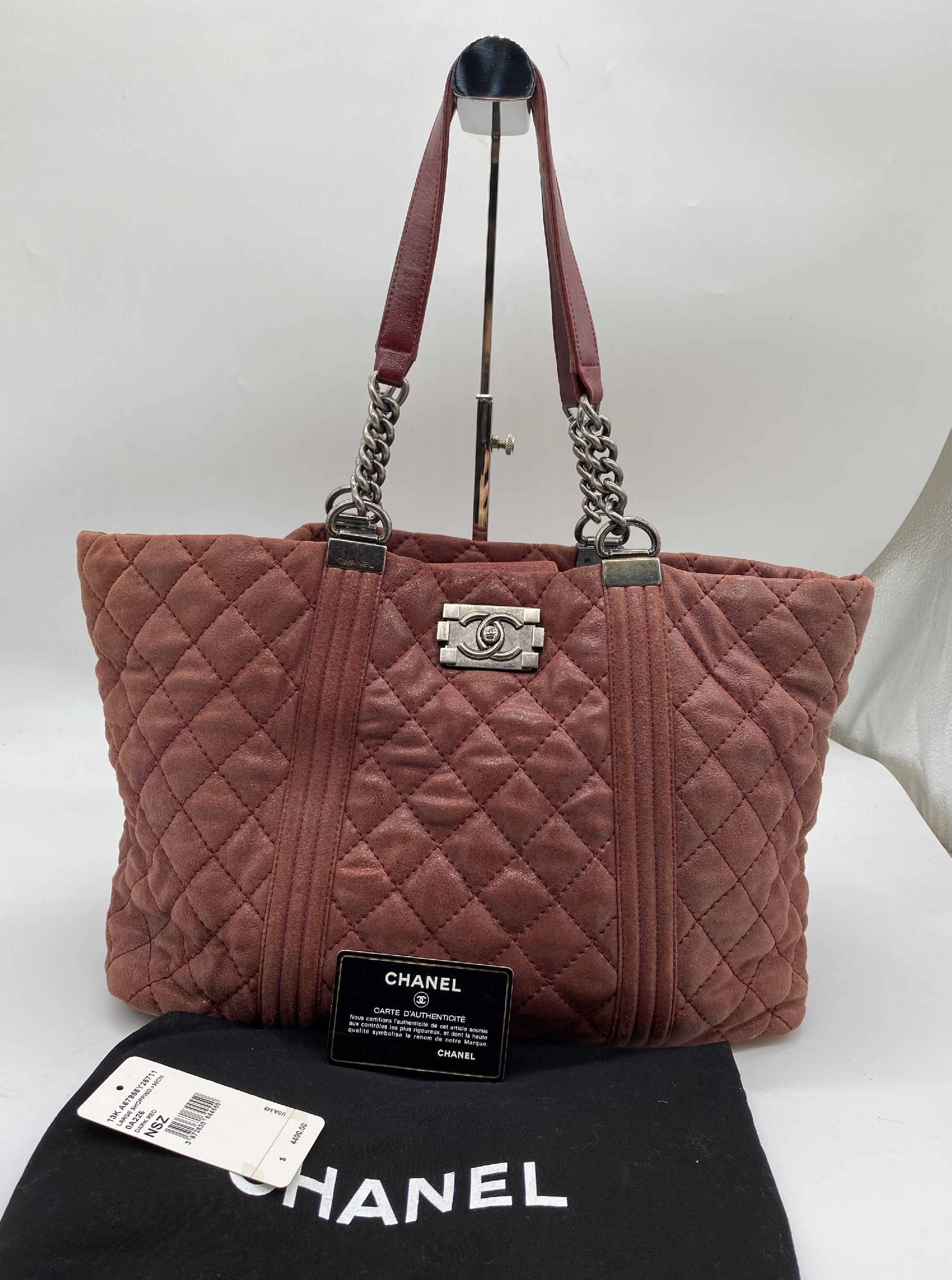 Boy Chanel leather chain tote bag with seal. Card number in the 18s range. Comes with dust bag.