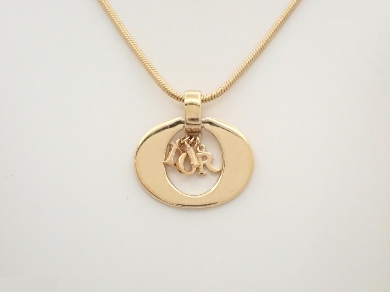 Necklace with logo, GP (gold plated), chain approximately 55cm long.