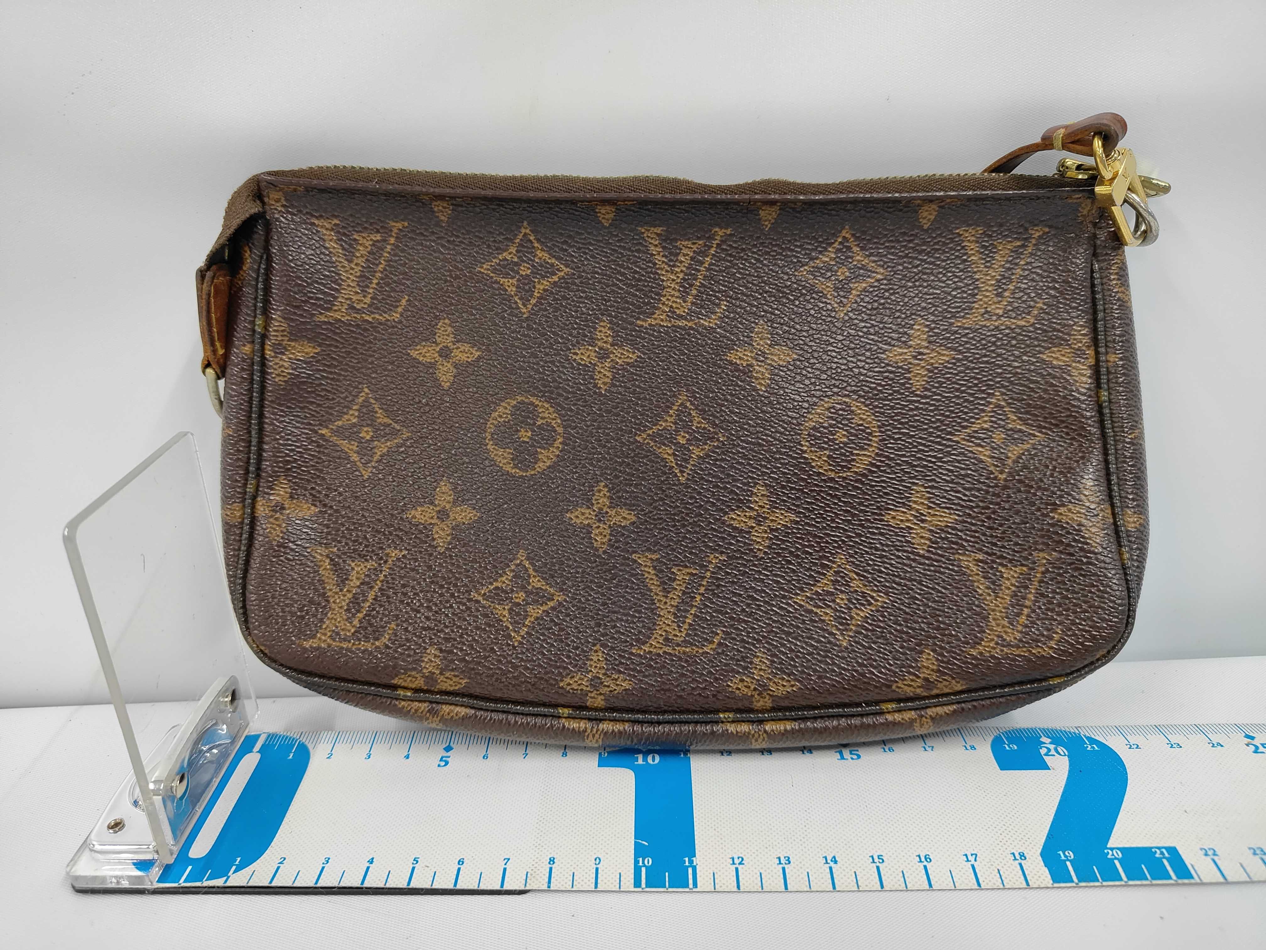 A. Monogram Pochette Accessoires Pouch Handbag — view 2