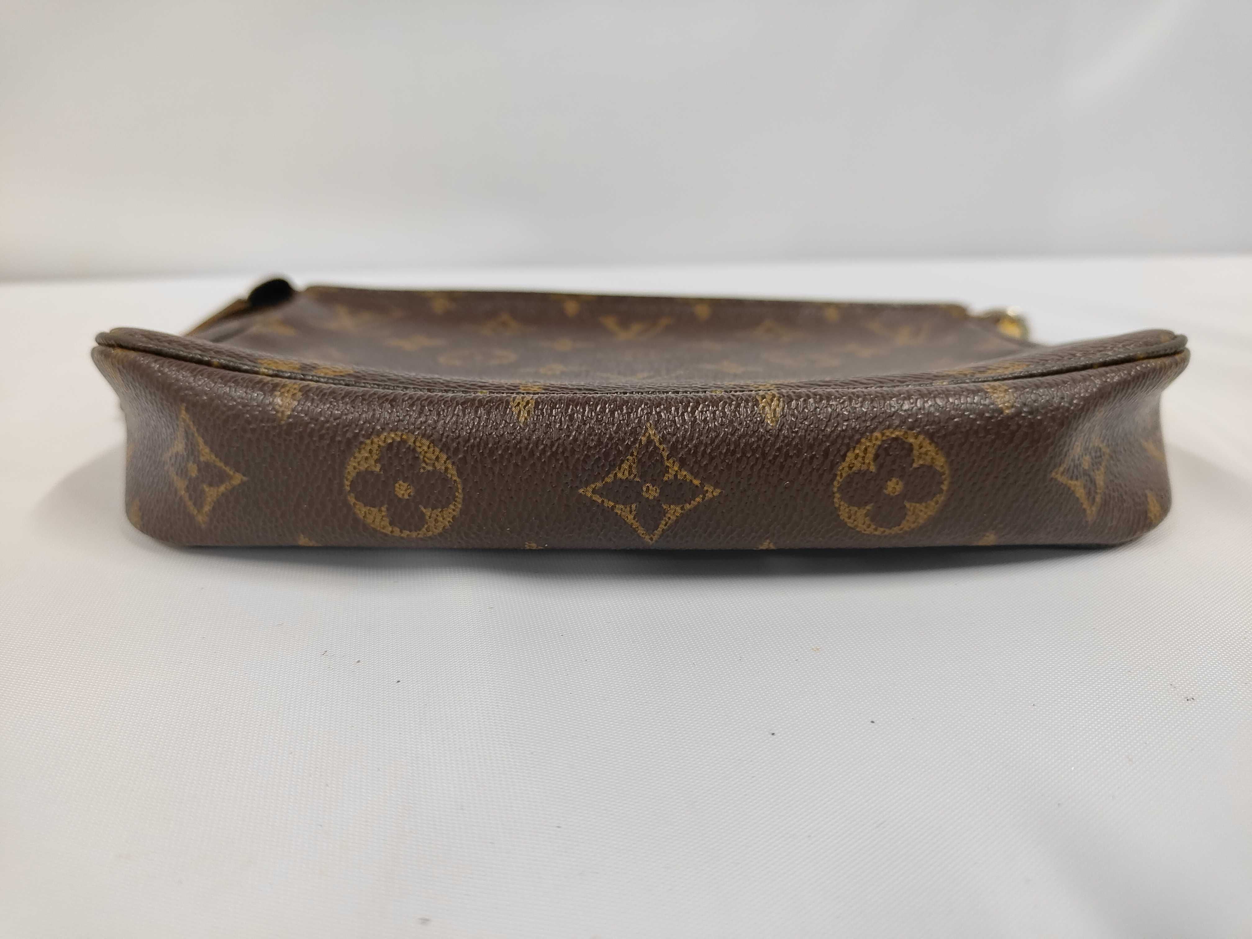 A. Monogram Pochette Accessoires Pouch Handbag — view 3