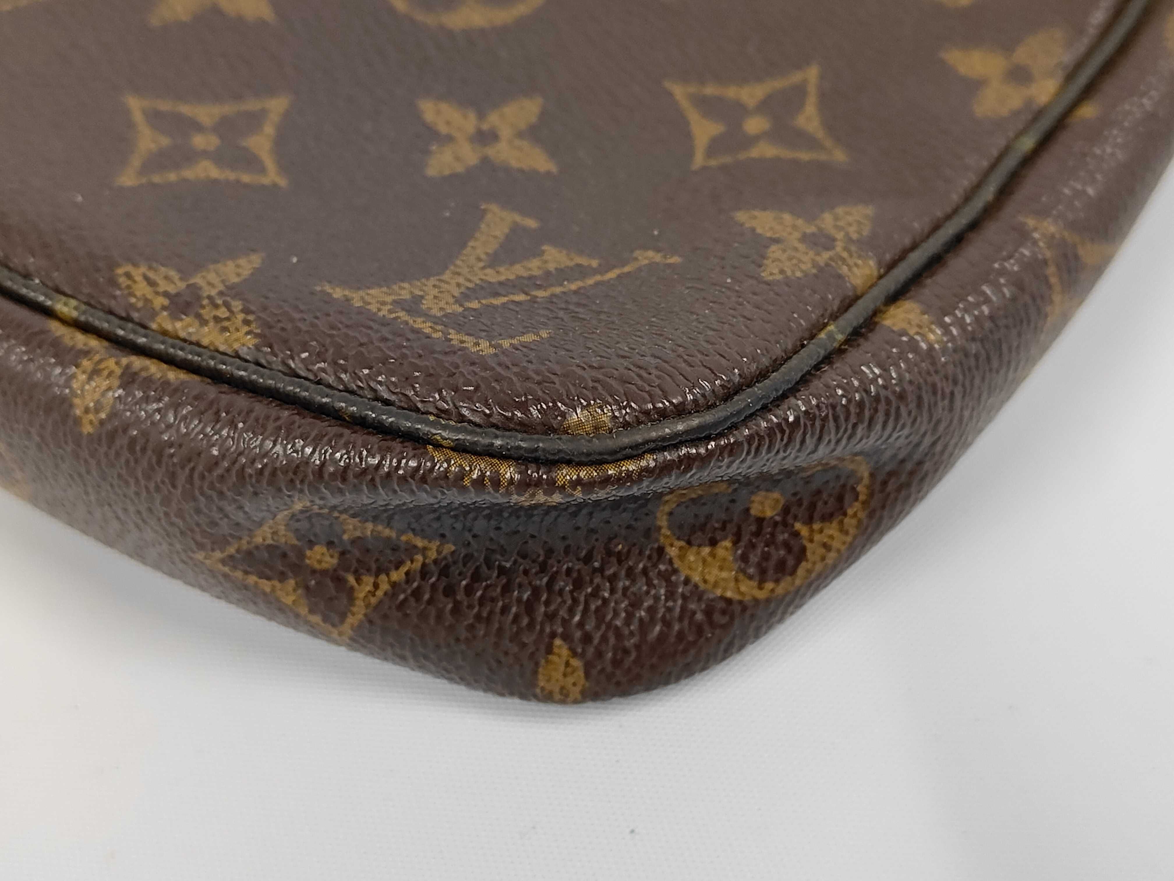 A. Monogram Pochette Accessoires Pouch Handbag — view 4