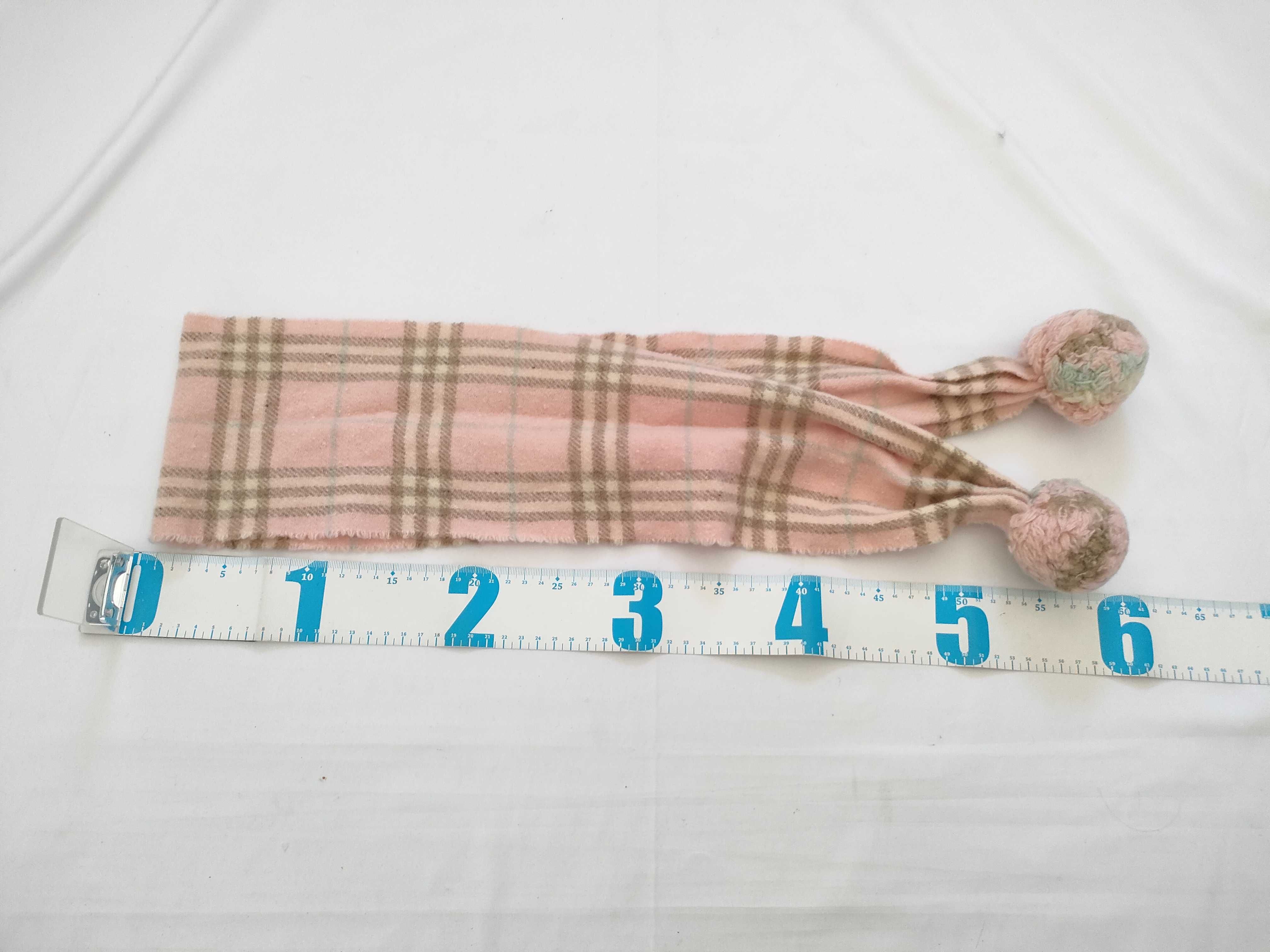 scarf with pom-poms, Nova Check pattern, pink, and other accessories. — view 2