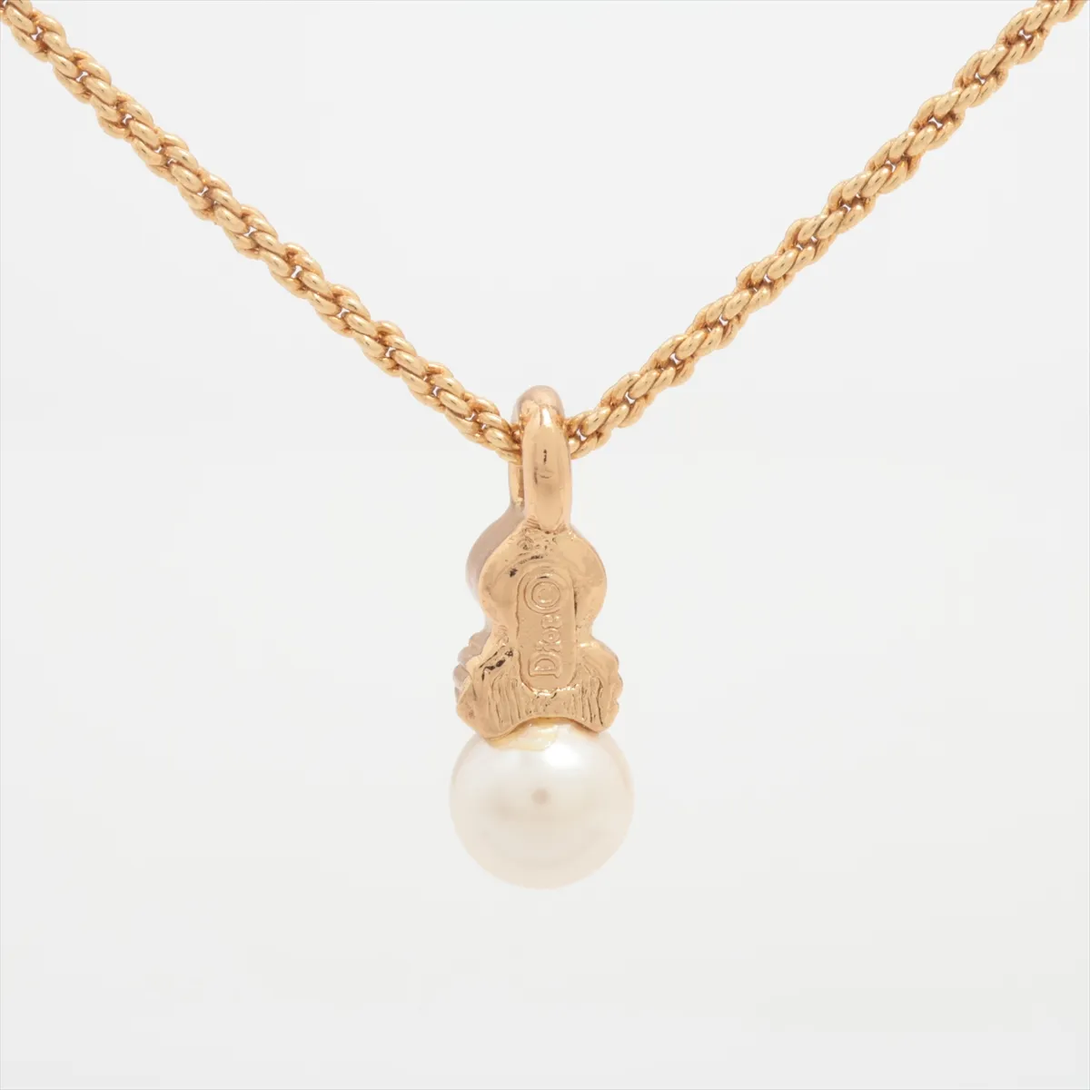 necklace, gold-plated with rhinestones and faux pearls. Shows wear, tarnishing, and discoloration. — view 2