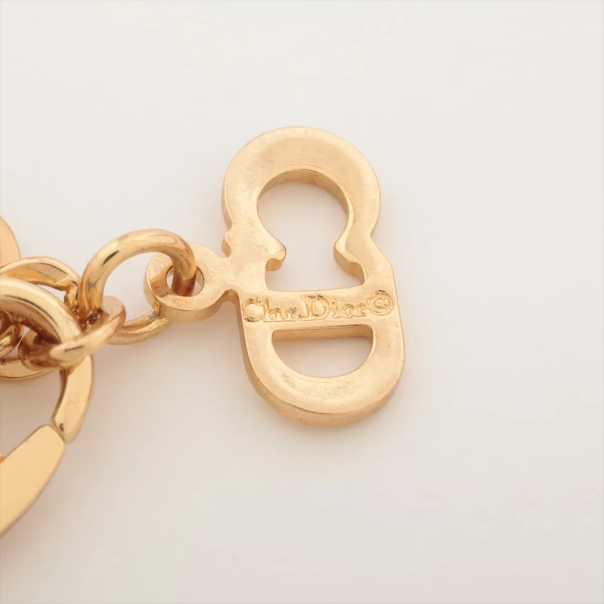 necklace, gold-plated with rhinestones and faux pearls. Shows wear, tarnishing, and discoloration. — view 4