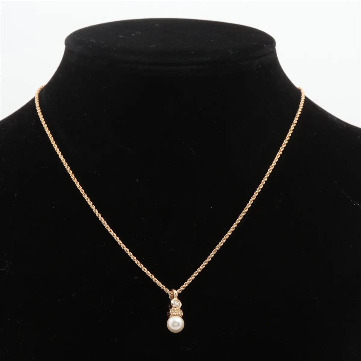 necklace, gold-plated with rhinestones and faux pearls. Shows wear, tarnishing, and discoloration. — view 5