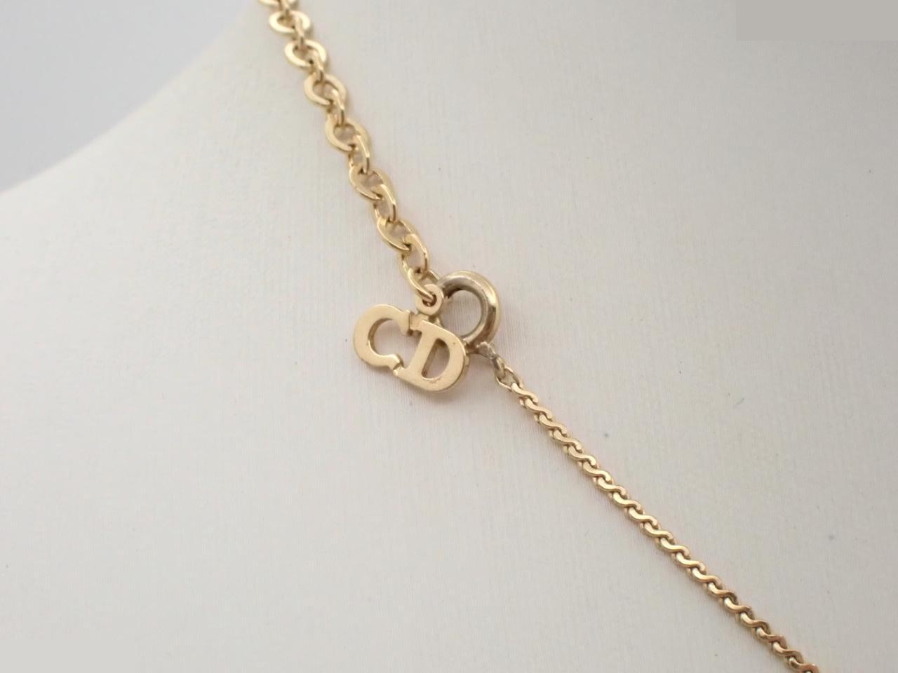 Other lines: Precious metals/necklaces, logo, circle, gold. — view 2