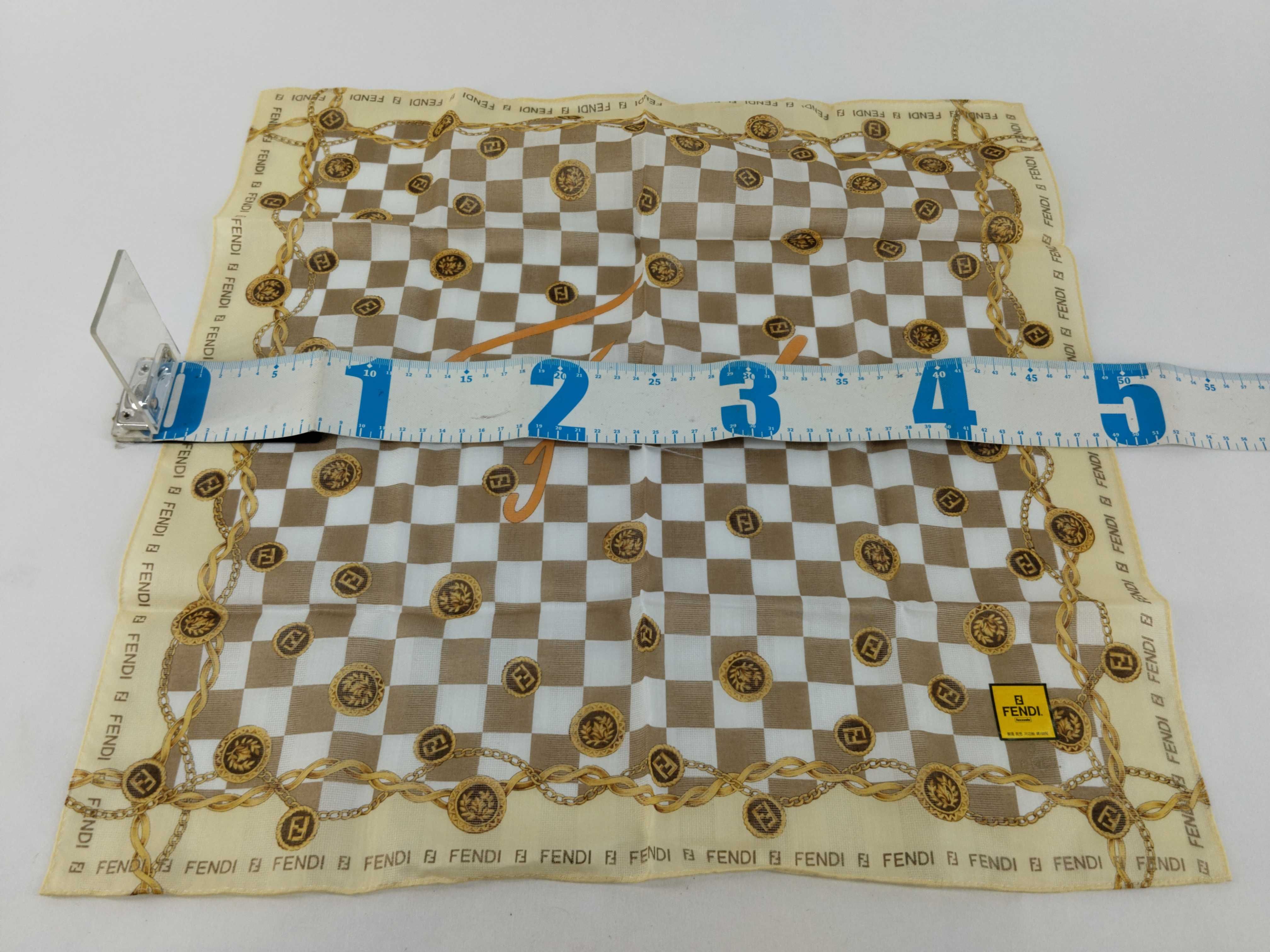 handkerchief scarf with sticker, FF Zucca big logo, chain, and other accessories. — view 2