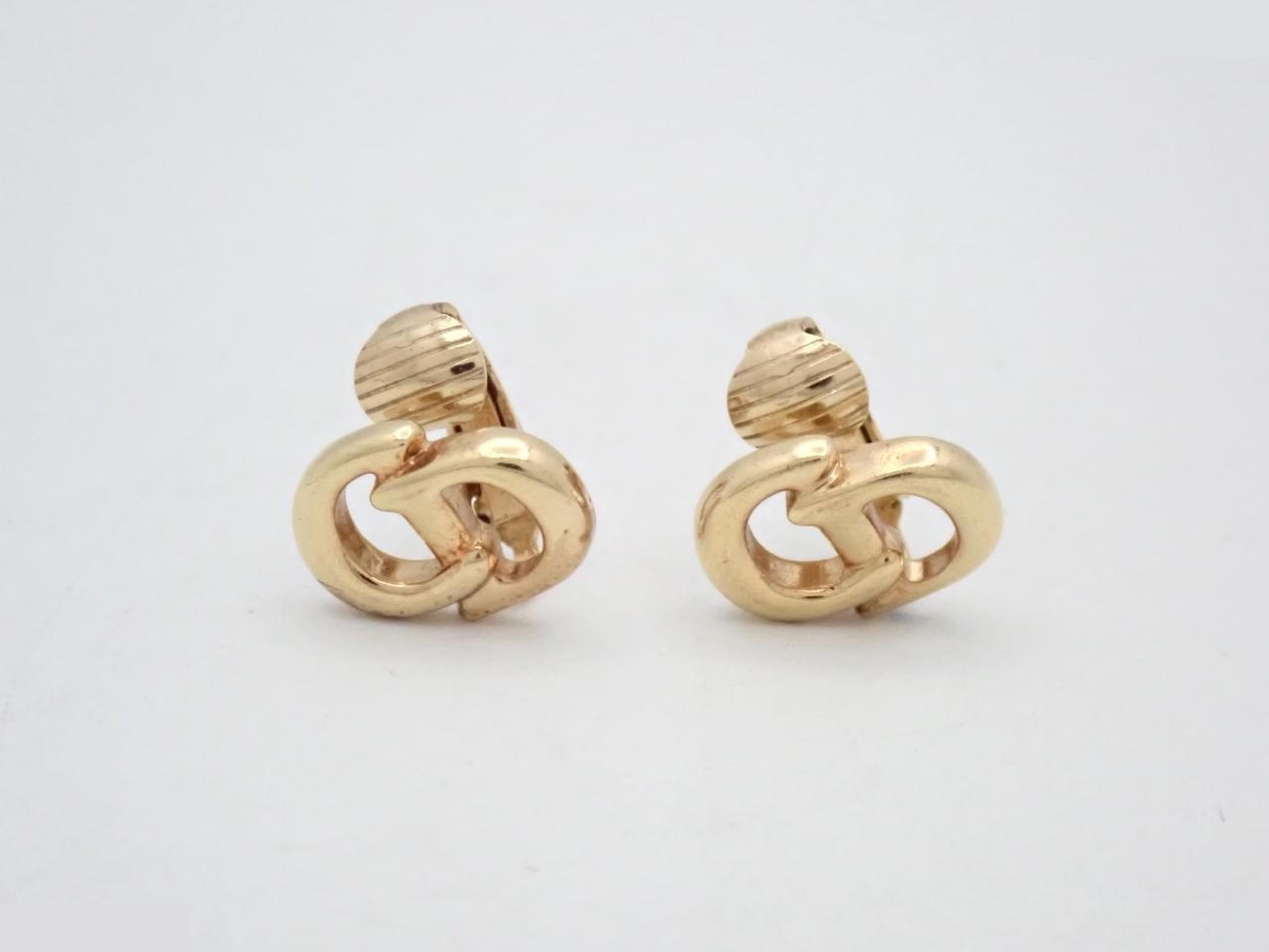 Other lines: Precious metals, earrings, logo, gold.