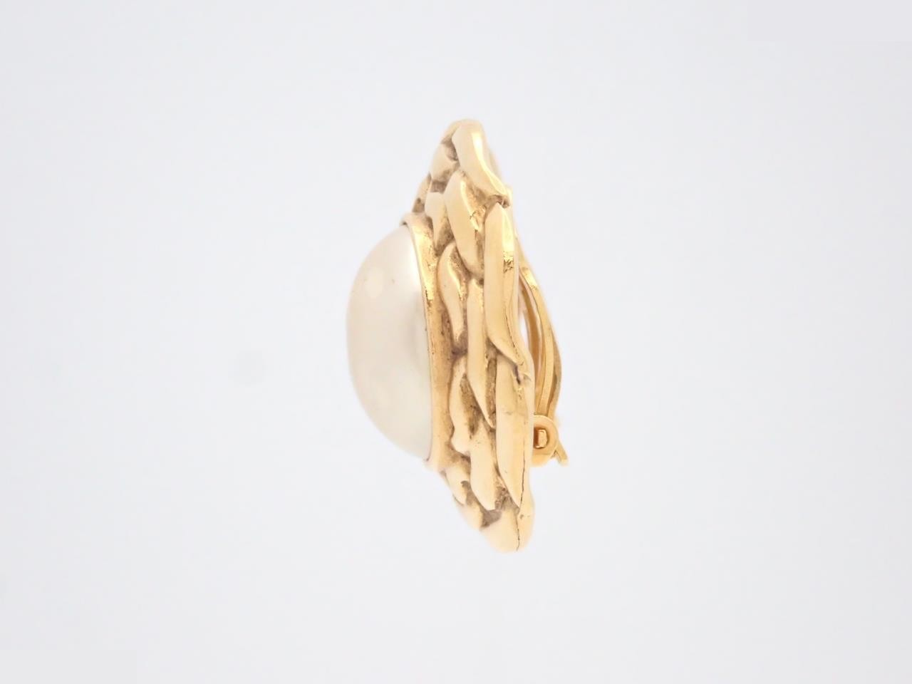 round earrings — view 3